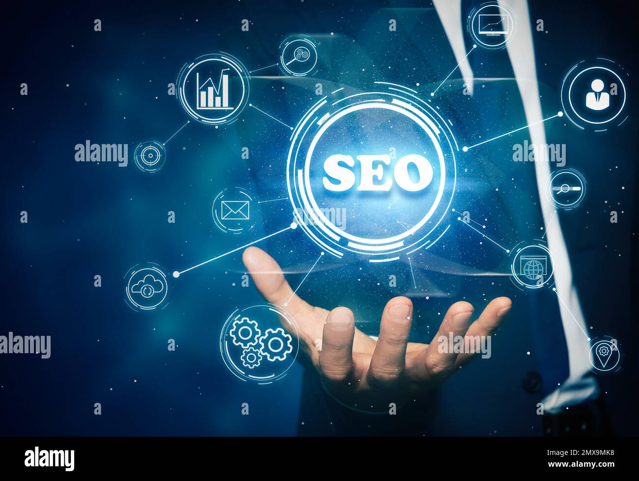 Man demonstrating directions of SEO. Icons of keyword research, customization and others Stock Photo