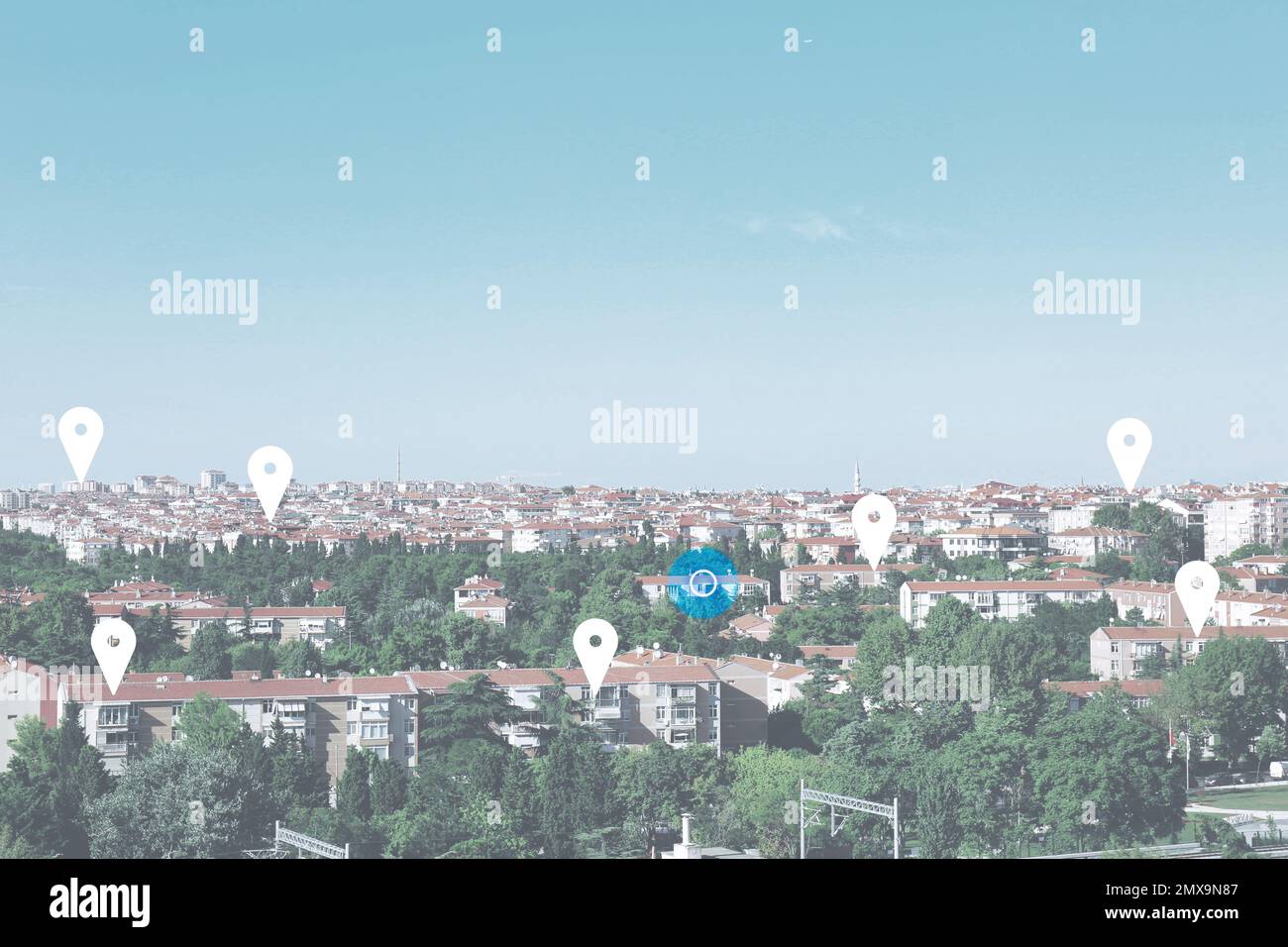 Multiple Pin Location Buildings Searching location. Pins above buildings in city Stock Photo - Alamy
