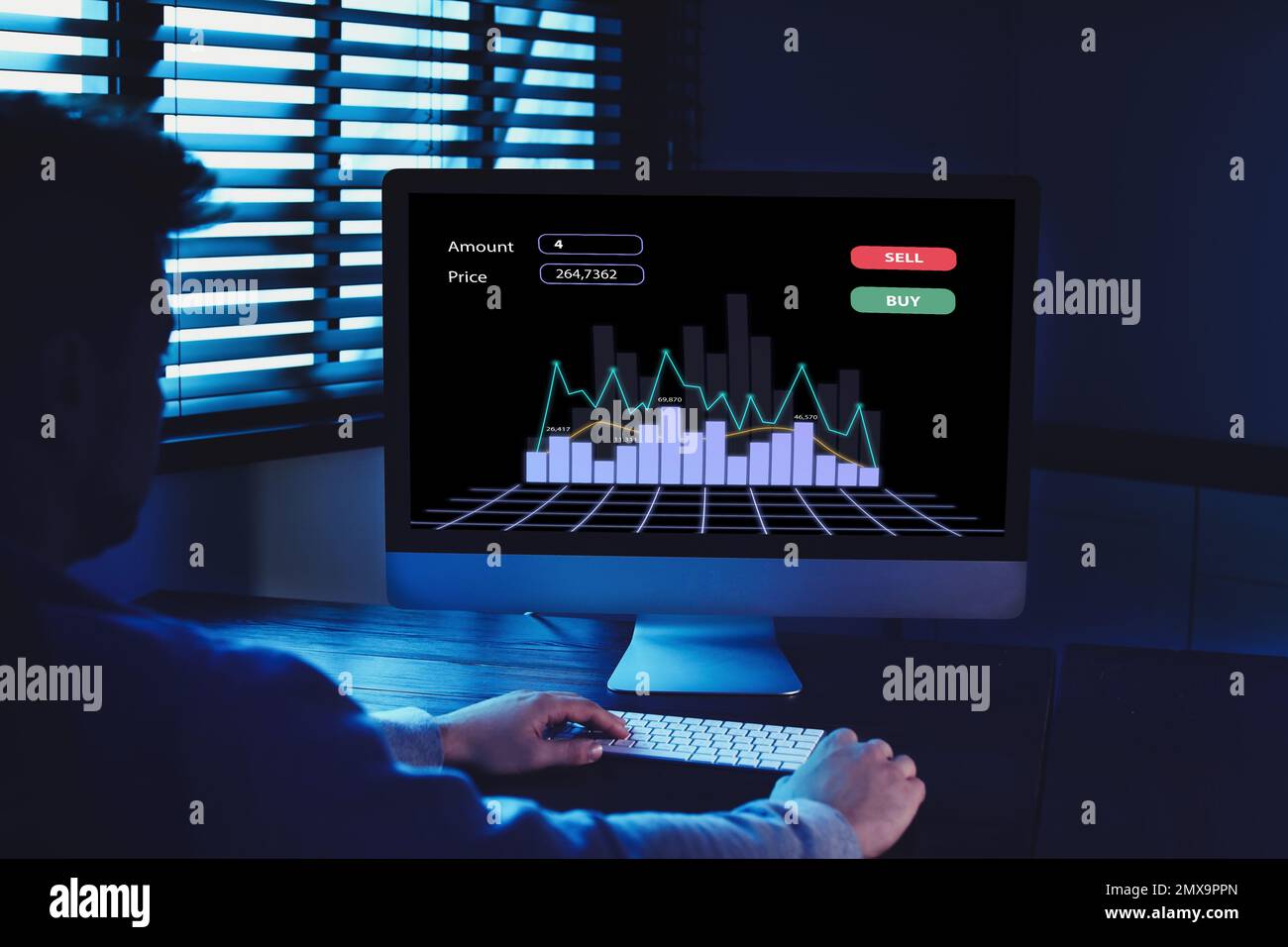 Broker using computer in dark room. Forex trading Stock Photo Alamy
