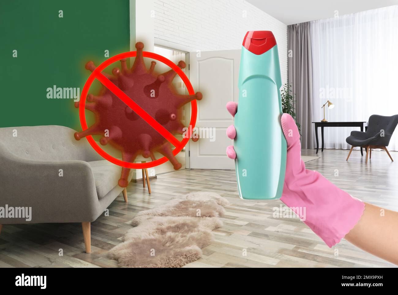Keep your home virusfree. Woman holding bottle of disinfecting solution in clean room Stock
