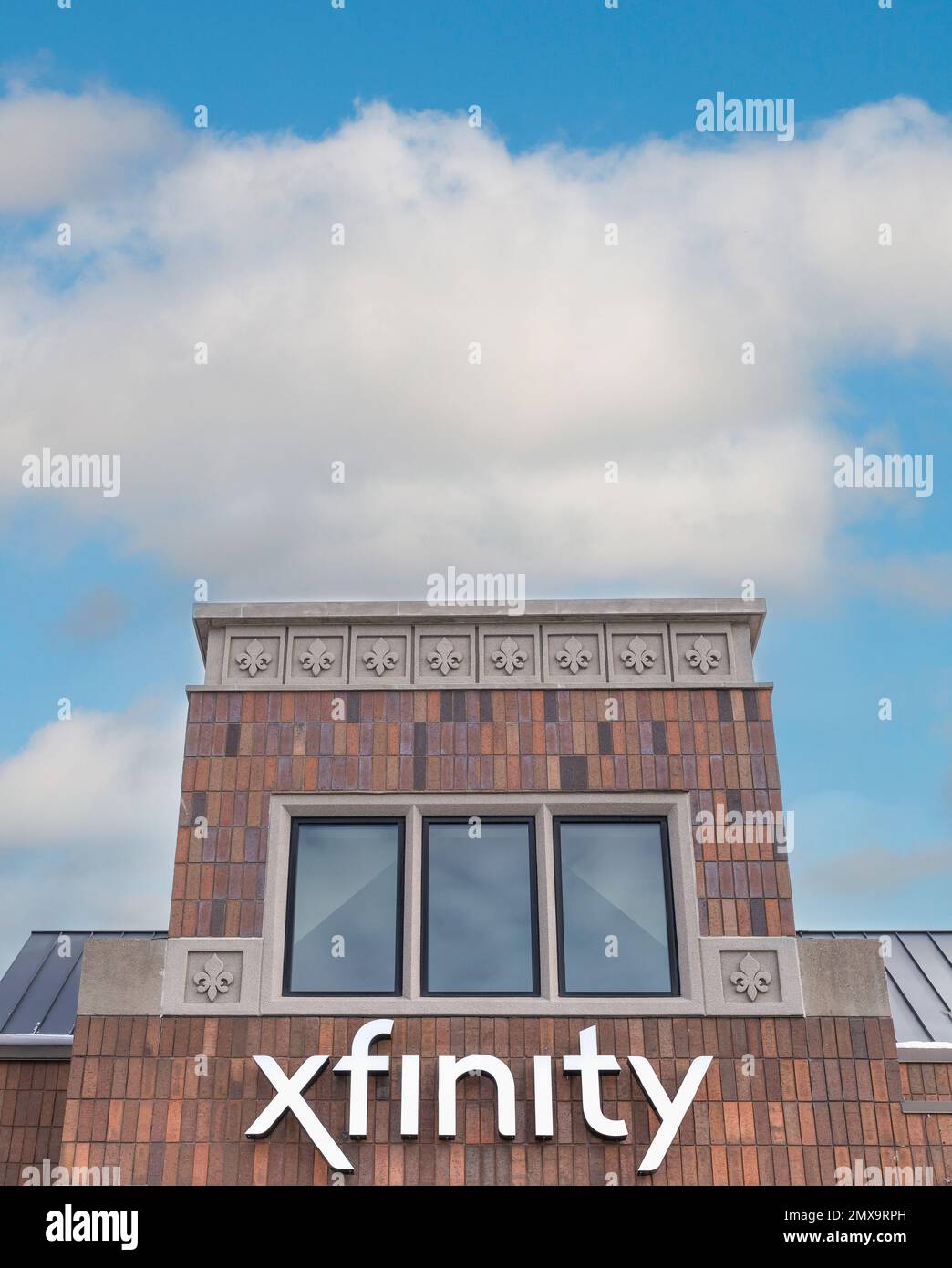 EDINA, MN, USA - FEBRUARY 1, 2023: Xfinity retail store exterior  and trademark logo. Stock Photo