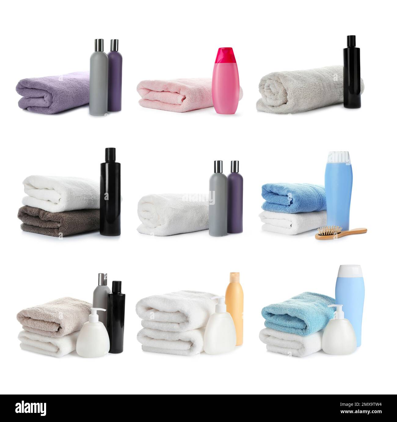 Set of folded soft terry towels and toiletries on white background Stock Photo