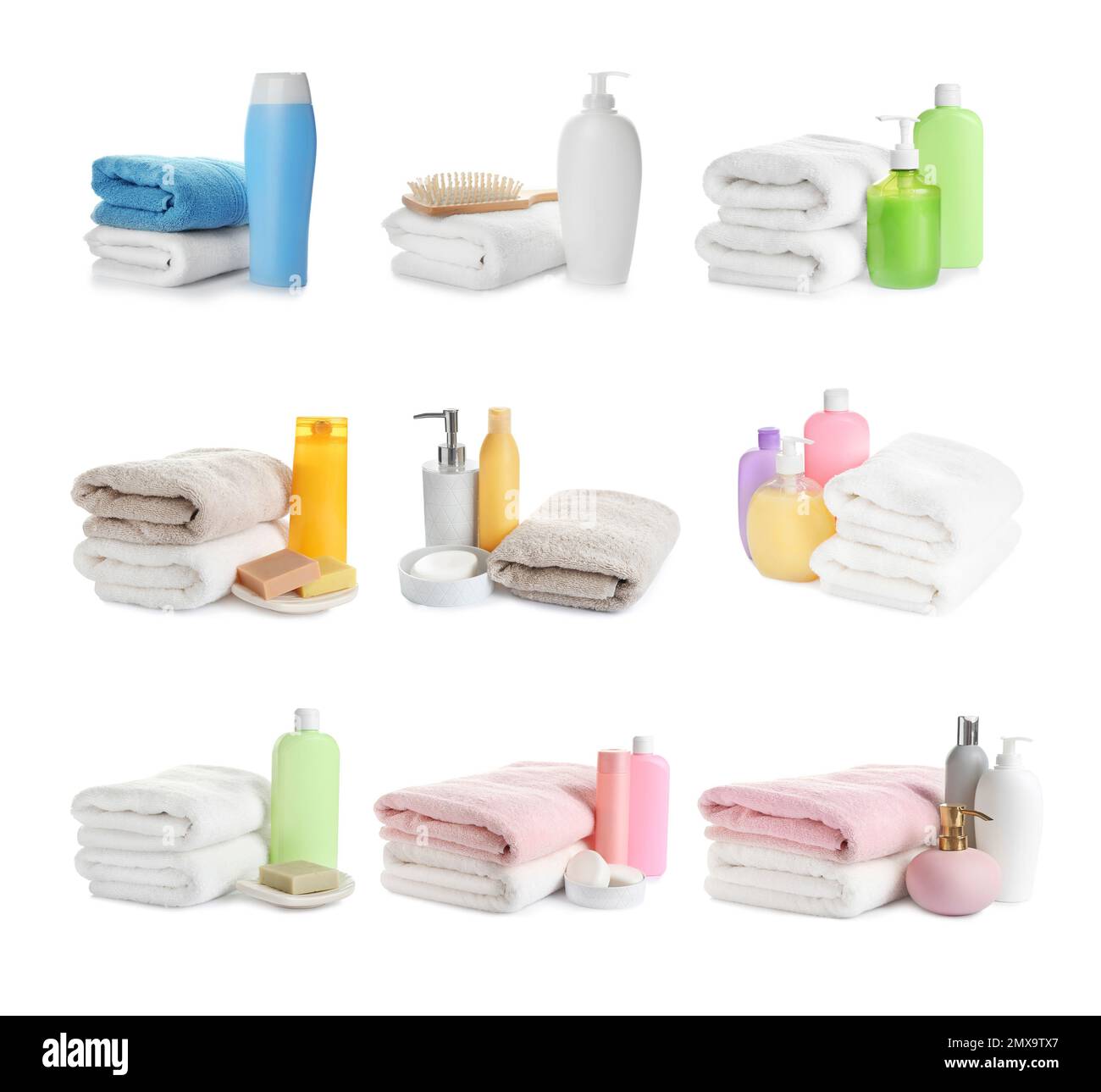 Set of folded soft terry towels and toiletries on white background Stock Photo