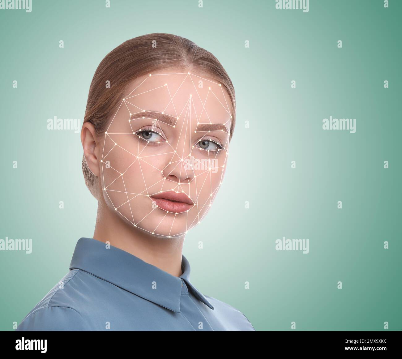 Facial recognition system. Young woman with biometric identification