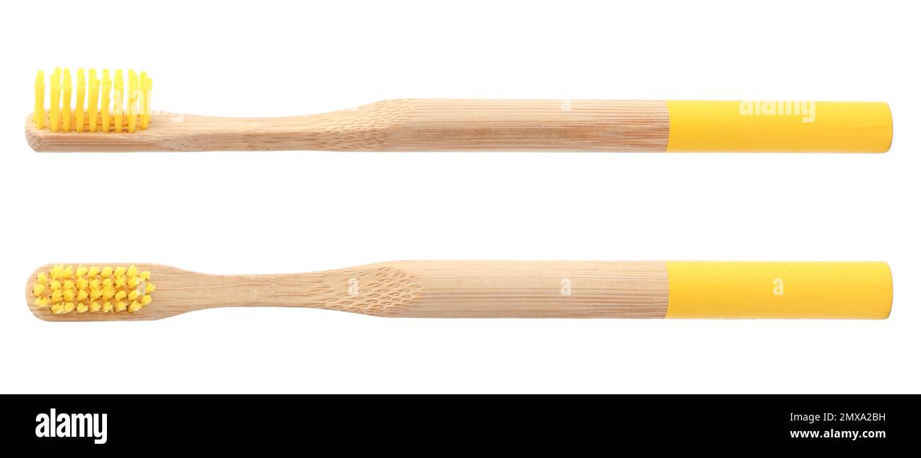Bamboo toothbrushes with yellow bristles on white background Stock ...