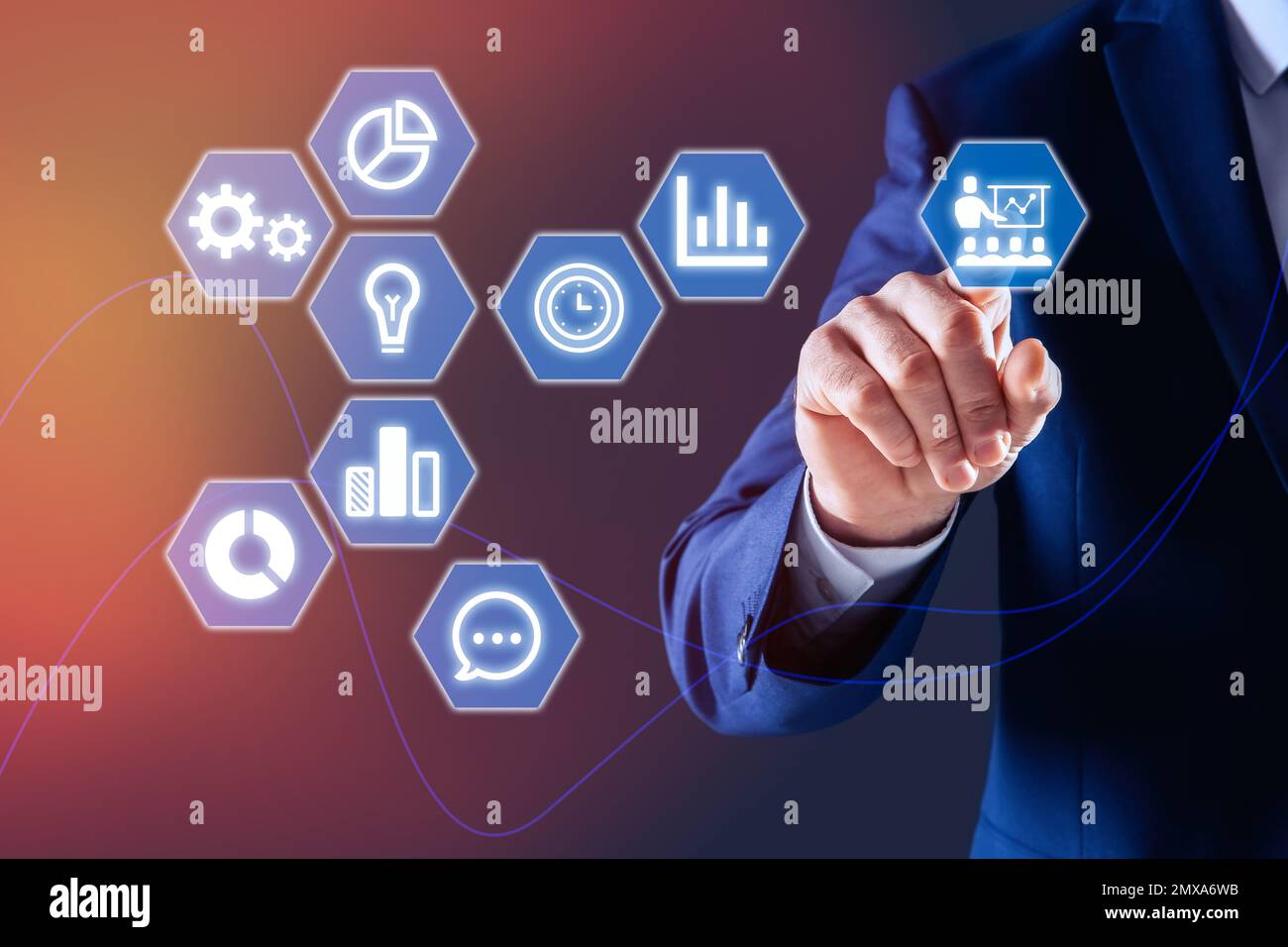 Core values concept. Businessman pointing at icon on virtual screen Stock Photo