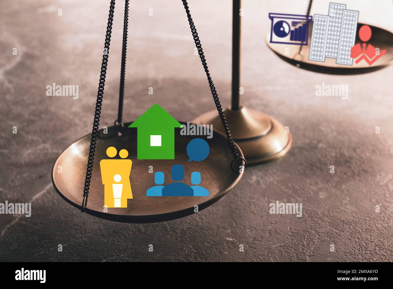 Work-life balance concept. Scale with images on table, closeup Stock ...