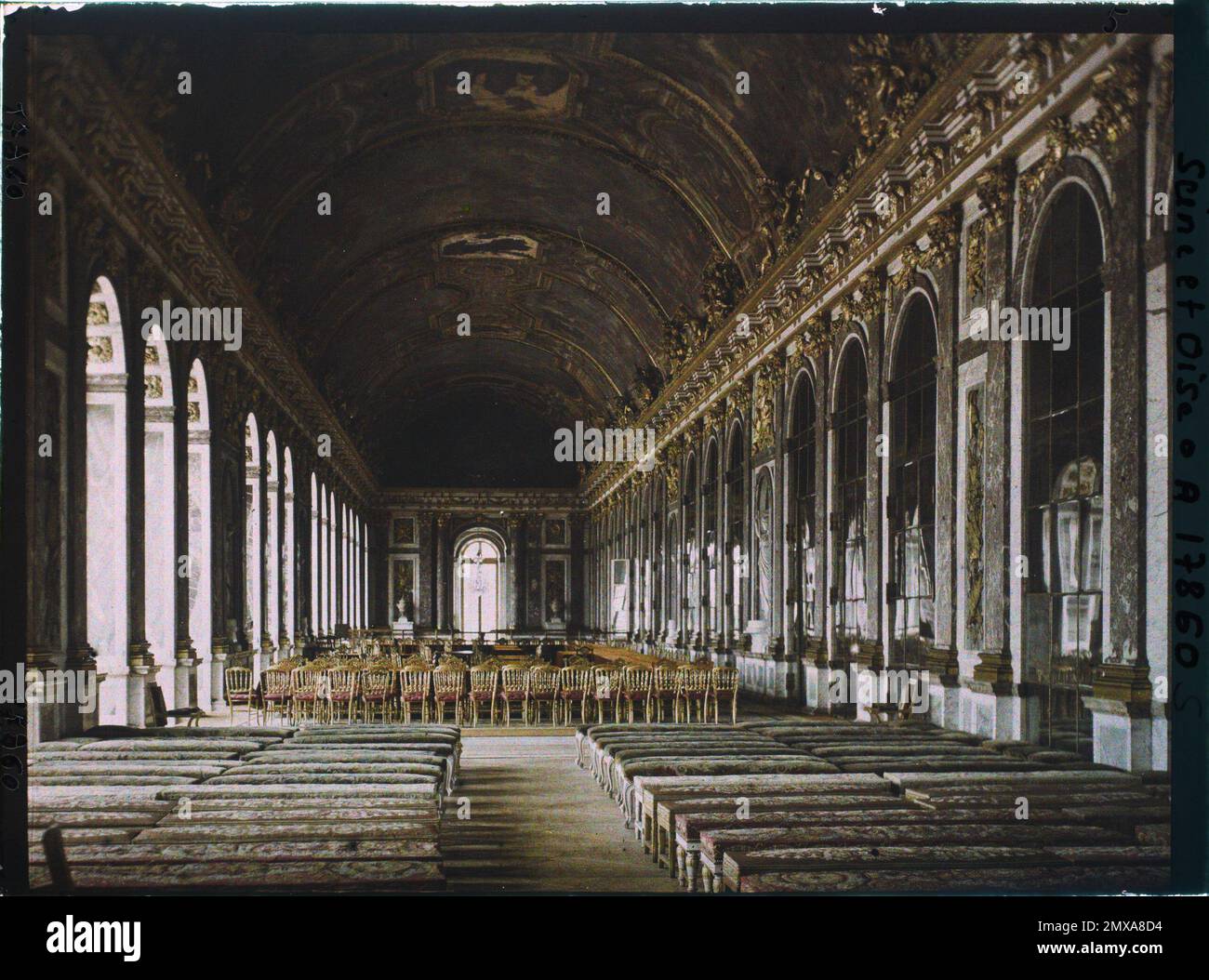Château de Versailles, France The Galerie des Glaces: at the Palais de Versailles, the day after the signing of peace, June 30, 1919 , 1919 - Versailles - Fernand Cuville Stock Photo