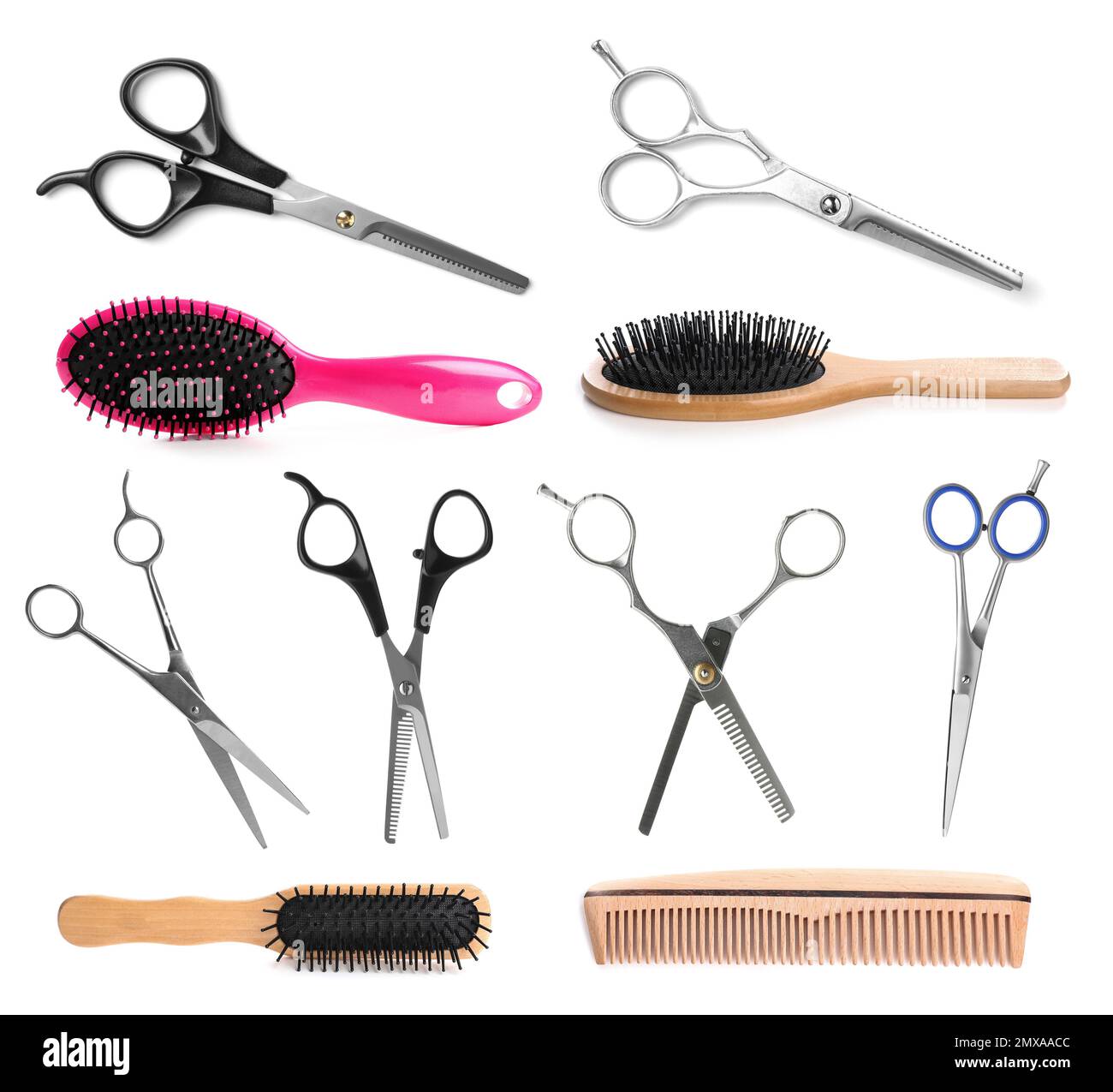 Set of different professional hairdresser scissors, brushes and combs