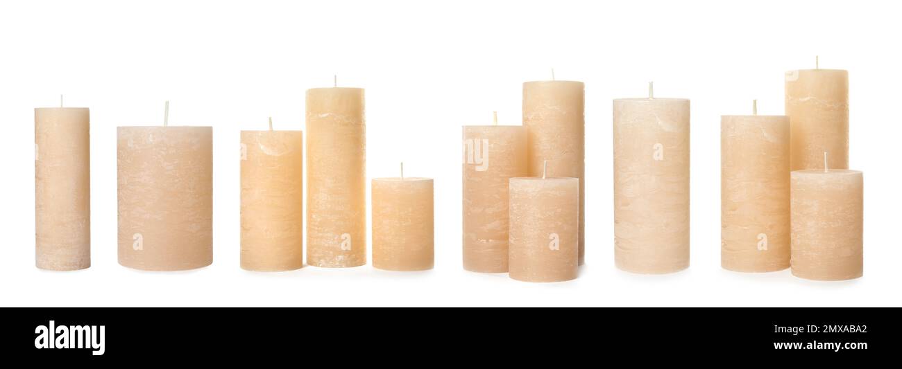 Set of color wax candles on white background. Banner design Stock Photo