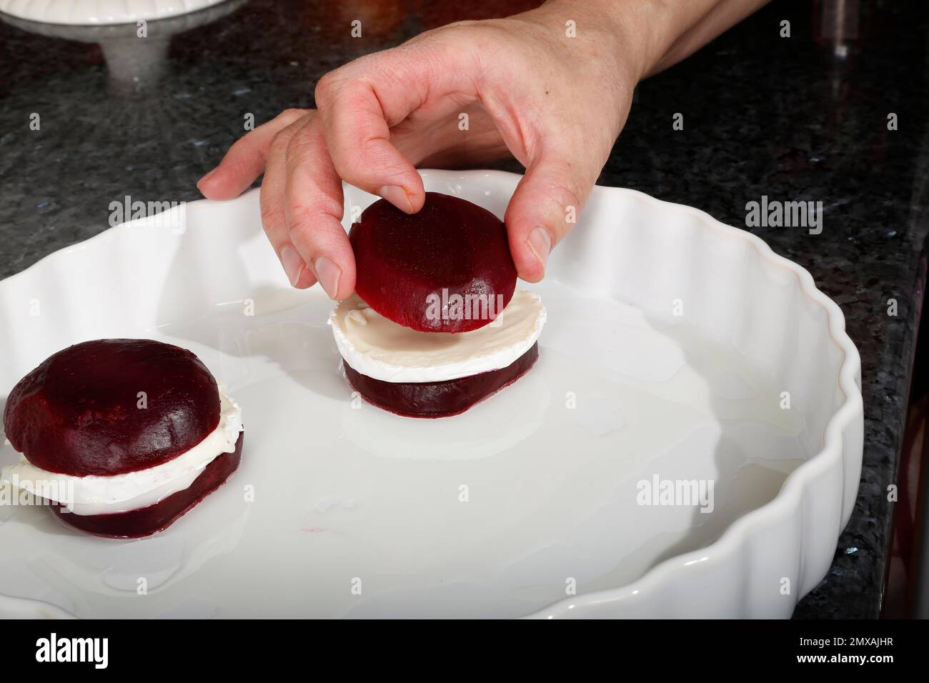 Southern German cuisine, preparation goat cheese beetroot burger, man's