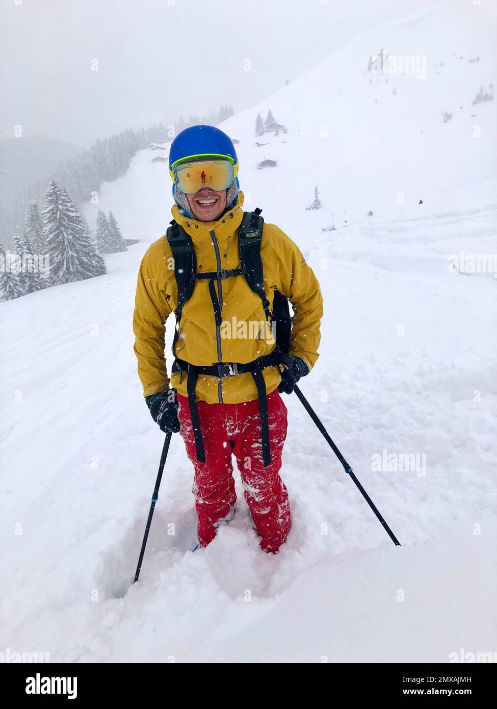 Skier in deep snow during snowfall, ski tour to Rauhkopf, Bavarian