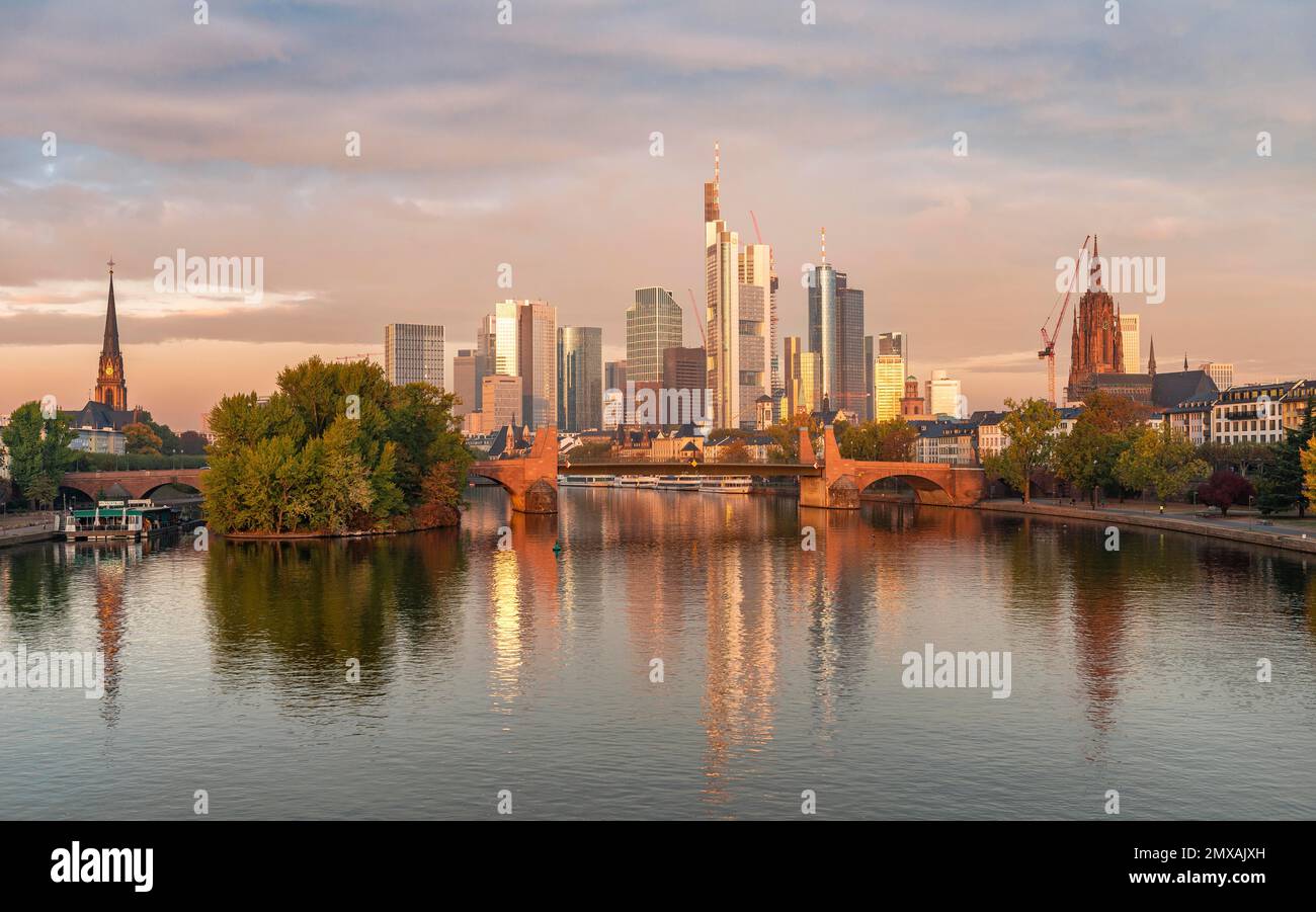 Skyline, skyscrapers in the banking district in the morning light, Old Bridge over the Main, sunrise, autumn, Frankfurt am Main, Hesse, Germany Stock Photo