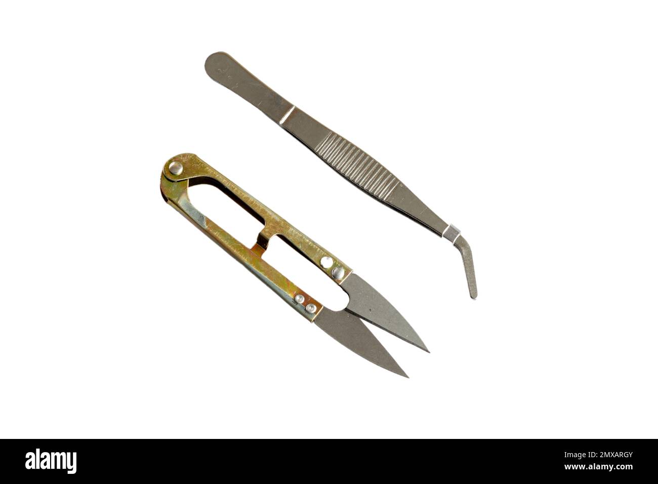 Tweezers and garden scissors isolated on white background Stock Photo