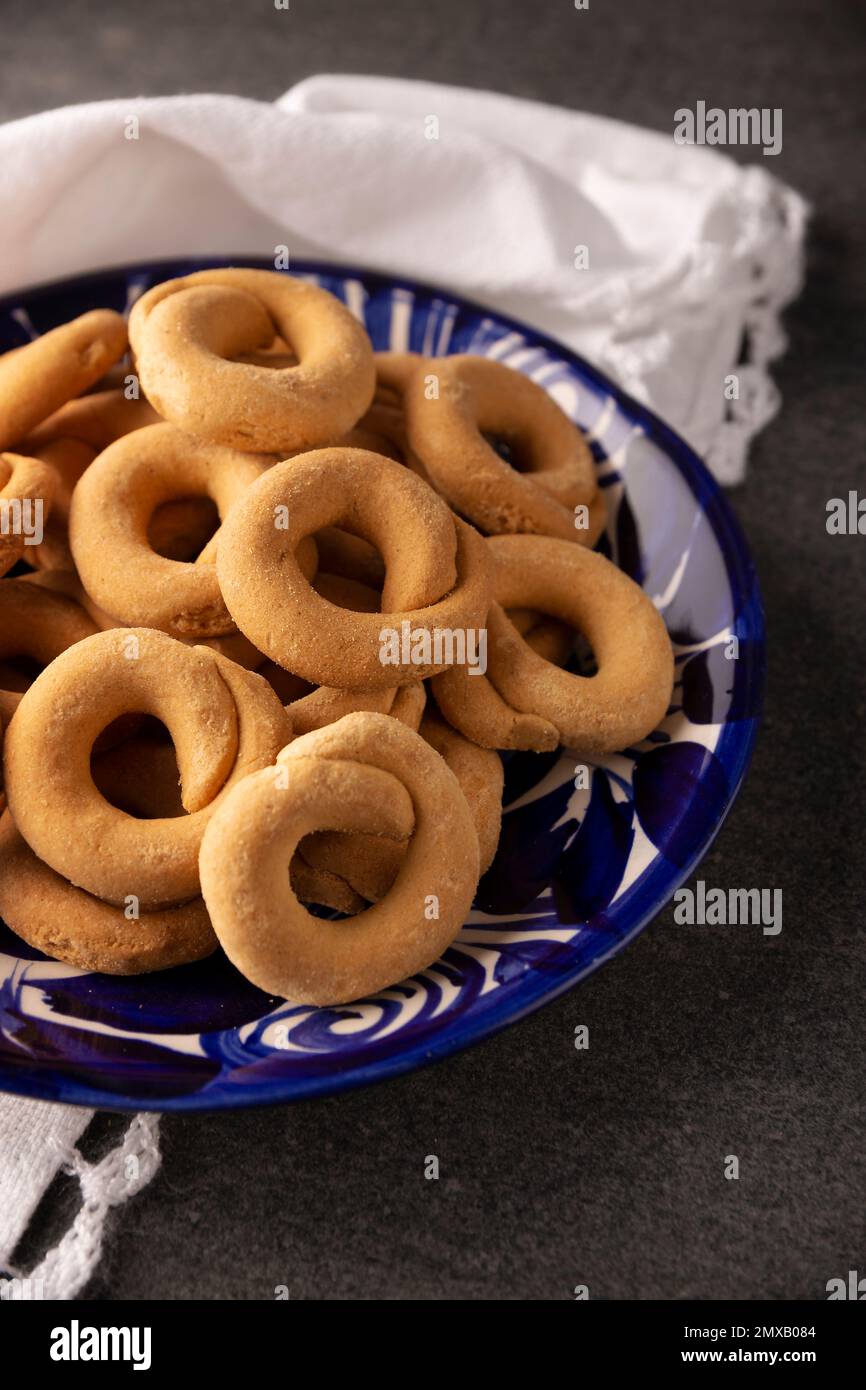 Coricos. Also known as Harinillas de maiz crudo, Tacuarines, Ensecos, Biscochos, Biscochuelos, Coricochis or Pemoles. Mexican corn cookies. Stock Photo