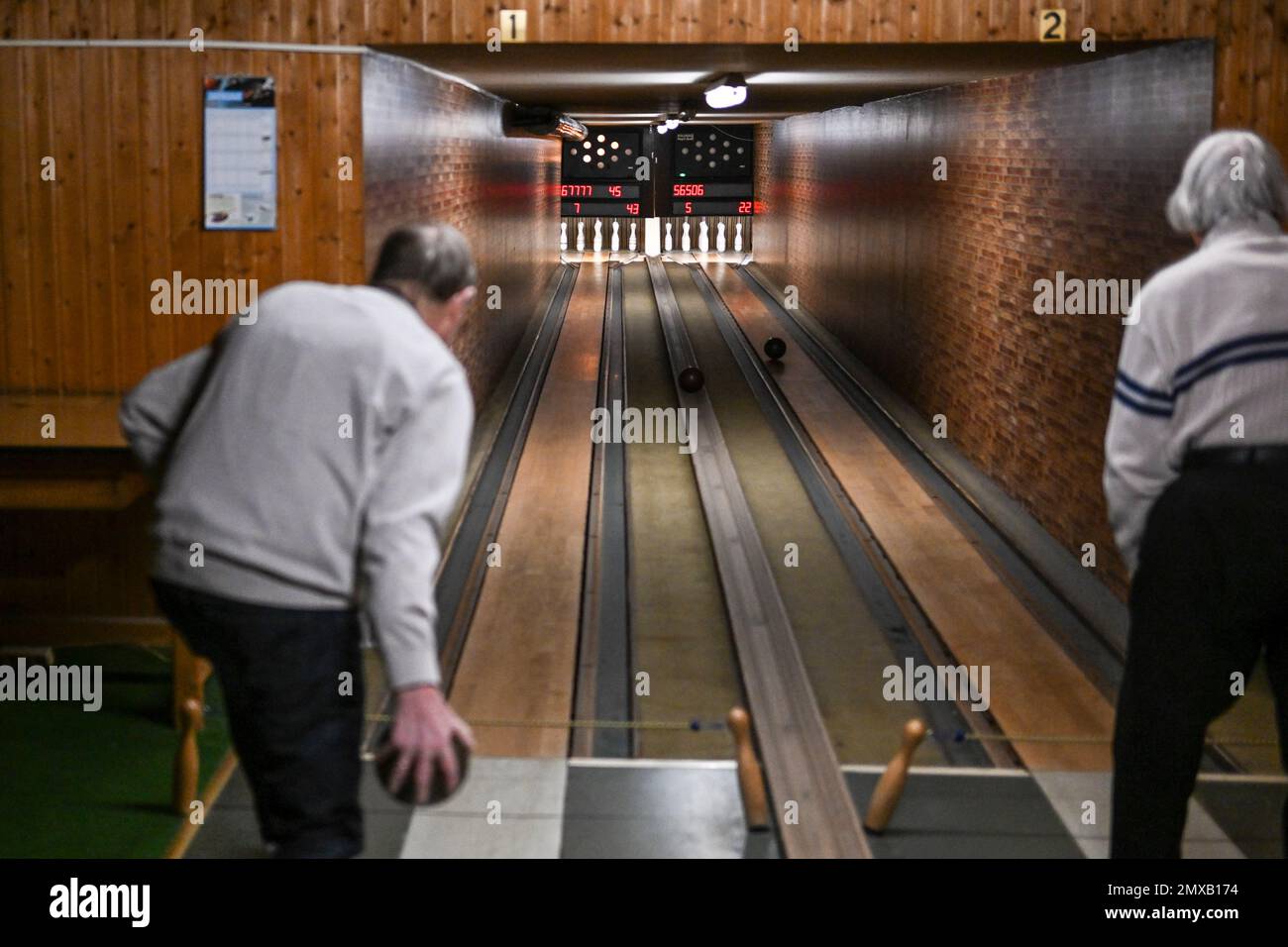 Berlin, Germany. 01st Feb, 2023. A woman and a man bowling at the