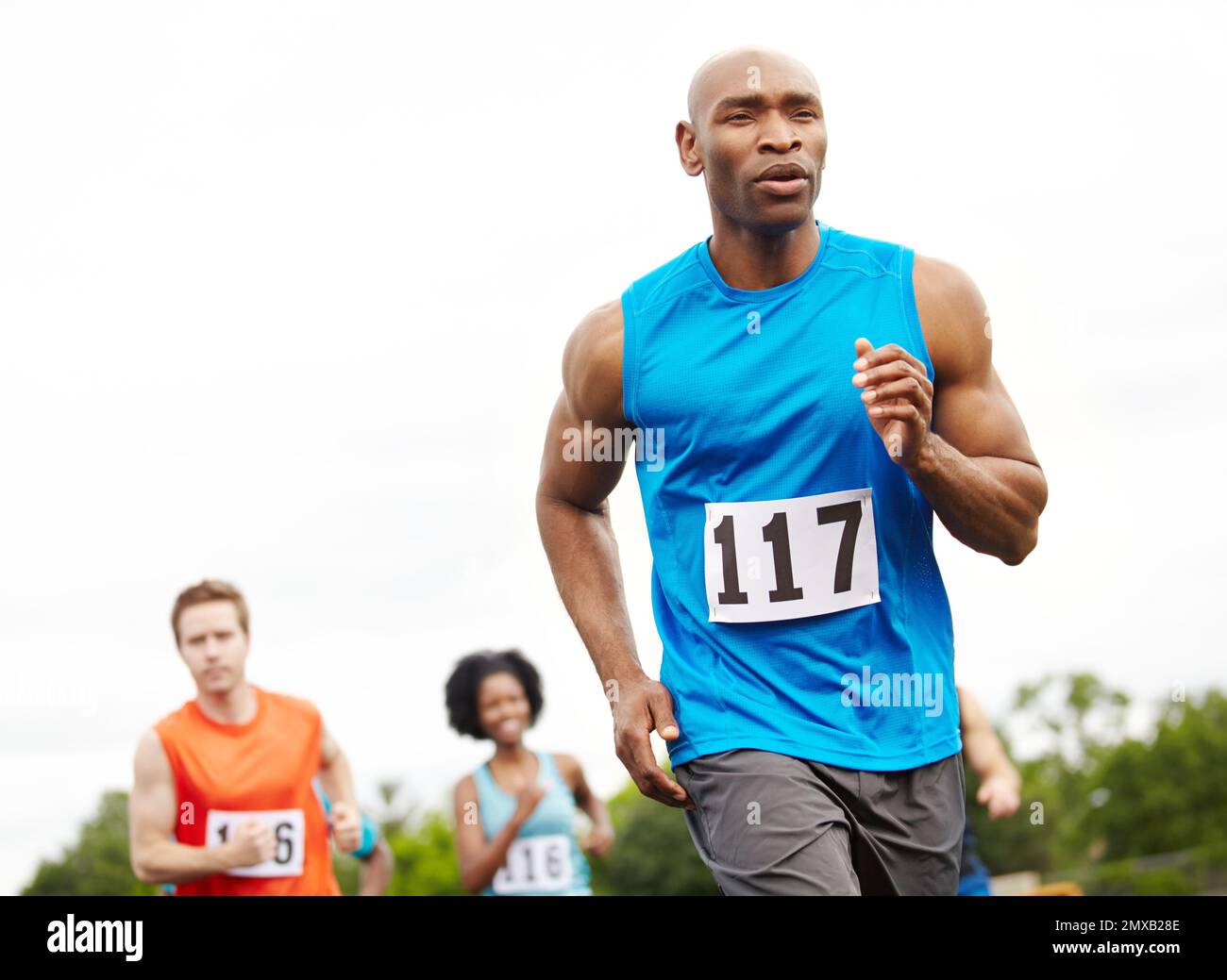 The end is in sight. Cropped front view of a driven male athlete
