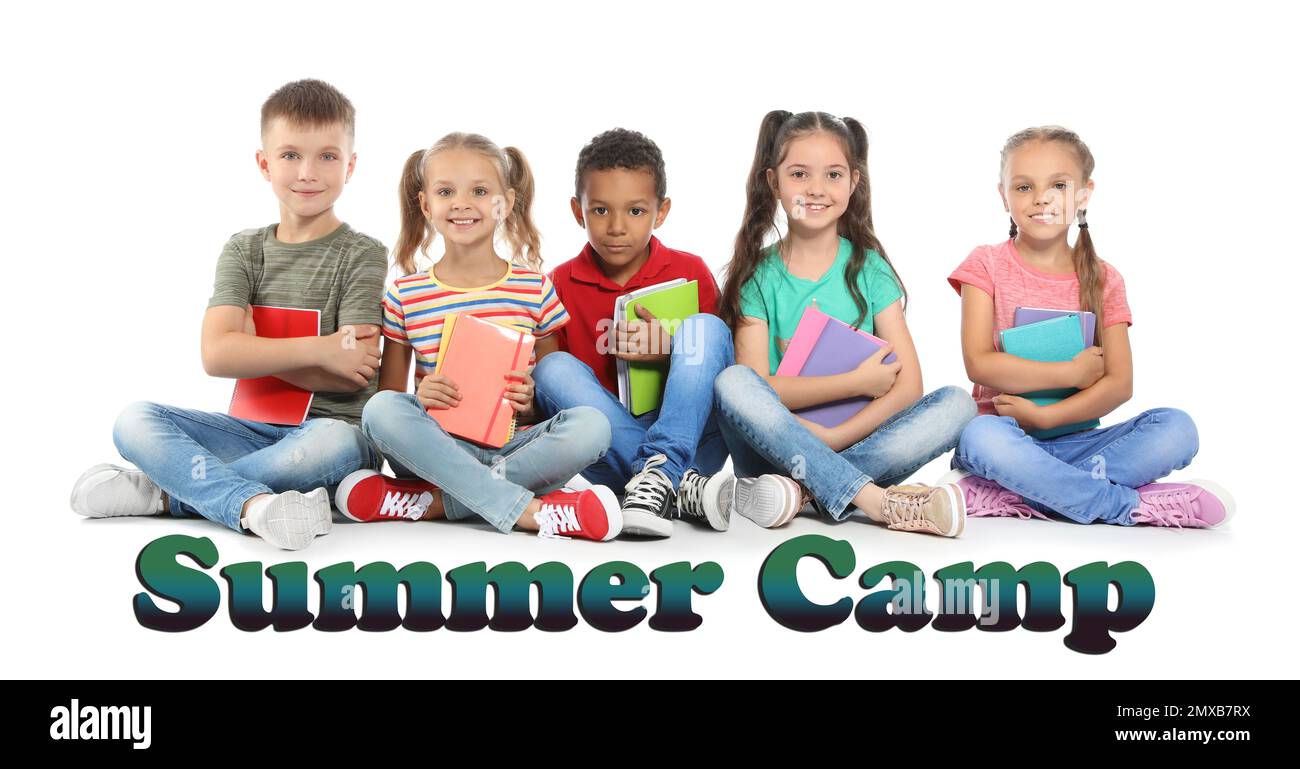 Group of little children with school supplies on white background