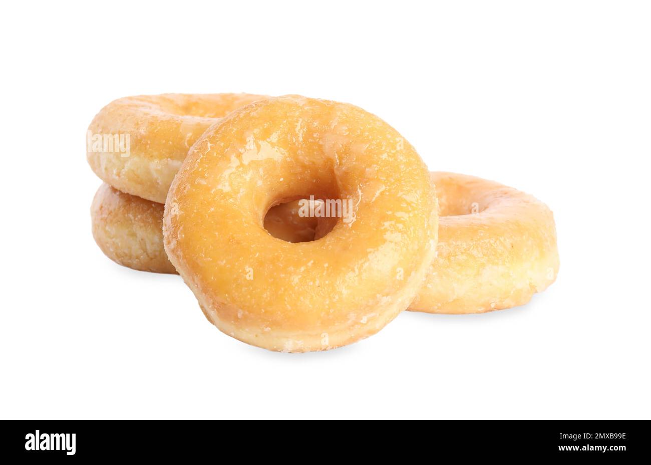 Sweet delicious glazed donuts on white background Stock Photo - Alamy