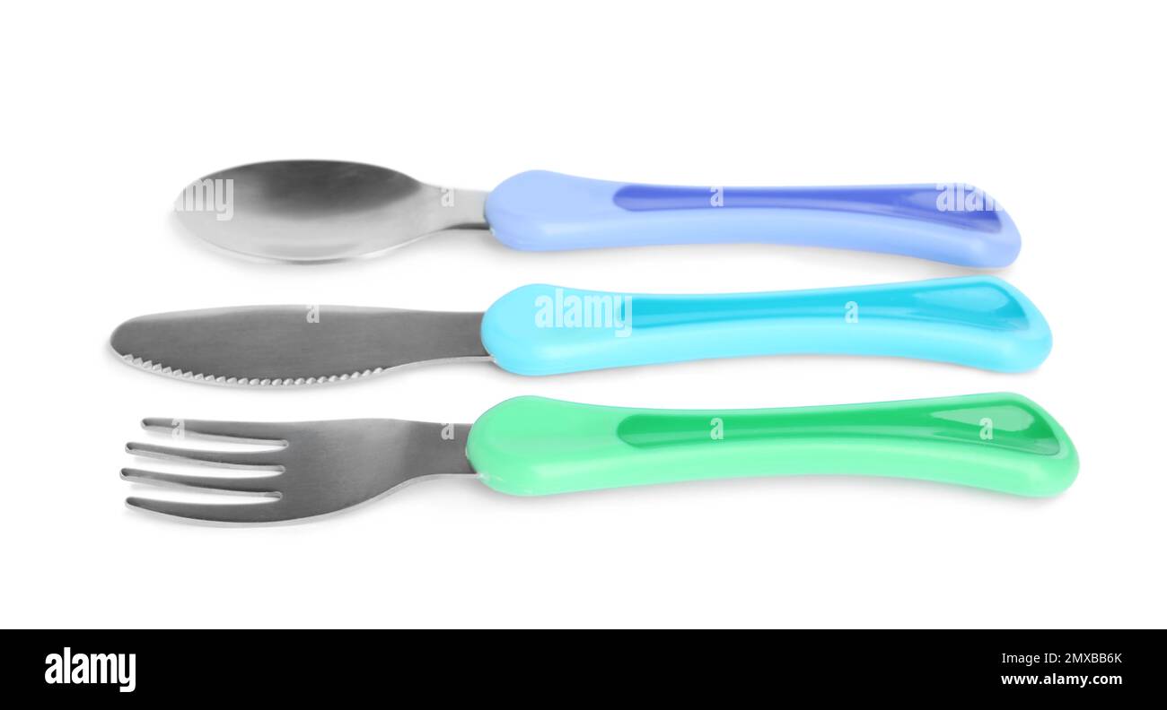 Set of small cutlery isolated on white. Serving baby food Stock Photo