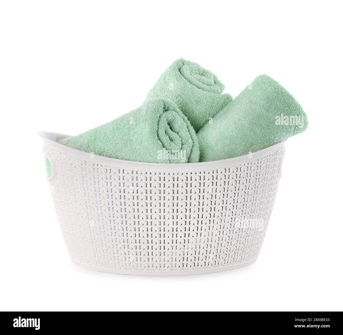 Fresh rolled towels in plastic bowl isolated on white Stock Photo