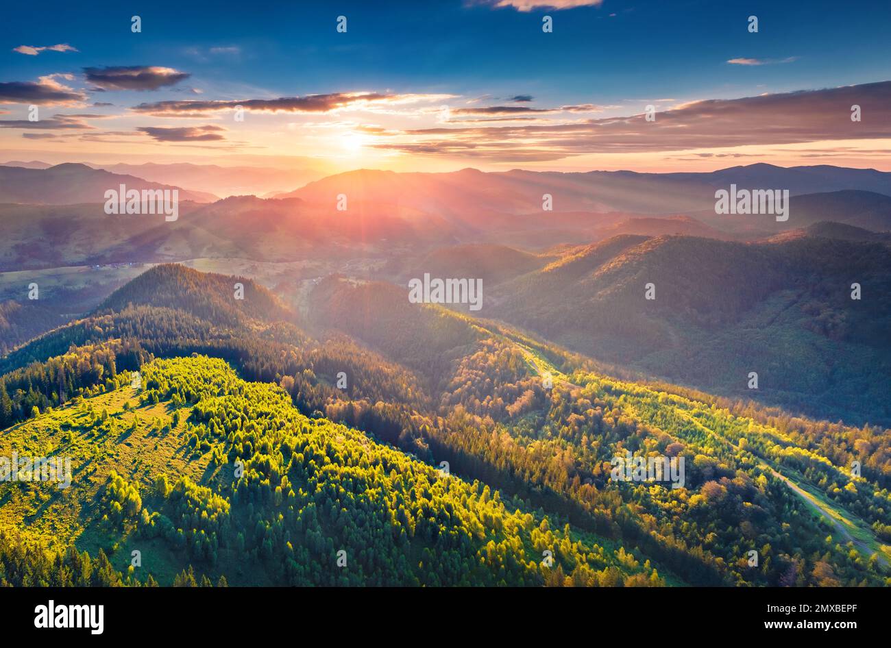 Beautiful summer scenery. Superb summer view from flying drone of Carpathian mountains, Dzembronya village location, Ukraine, Europe. Stunnig morning Stock Photo