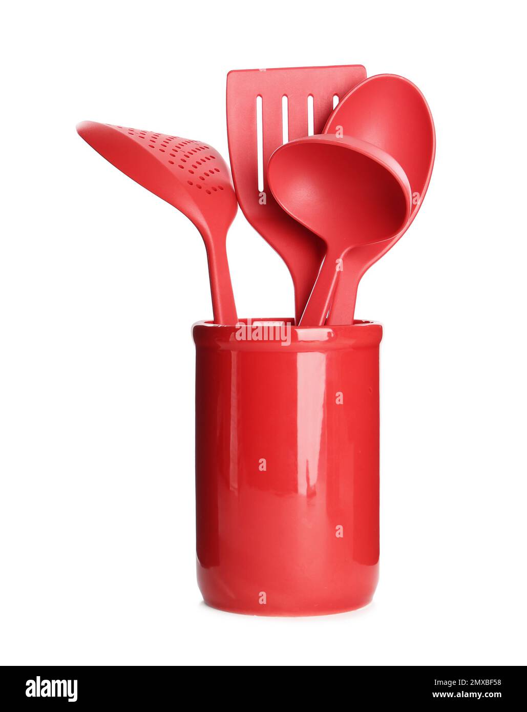 Set of red cooking utensils in holder isolated on white Stock Photo Alamy