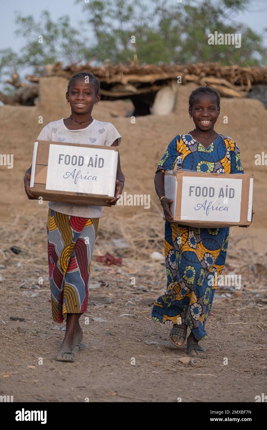 Children taking food aid home, Iftar service during Ramadan in Africa
