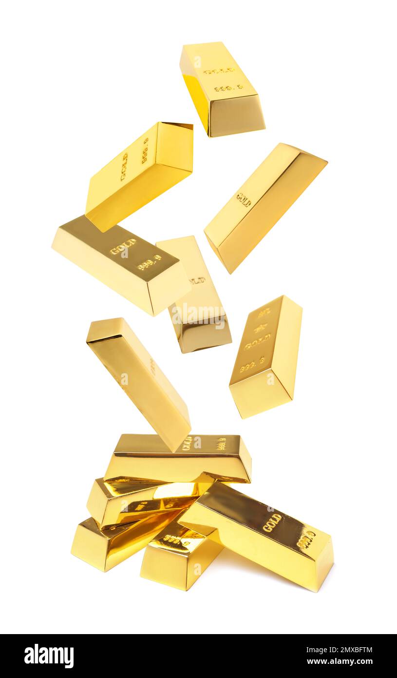 Shiny gold bars falling onto heap on white background Stock Photo Alamy