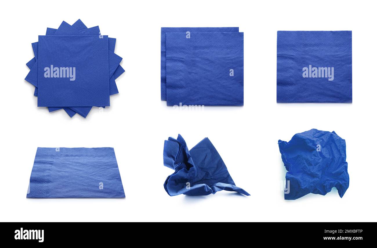 Set with blue paper napkins on white background Stock Photo Alamy