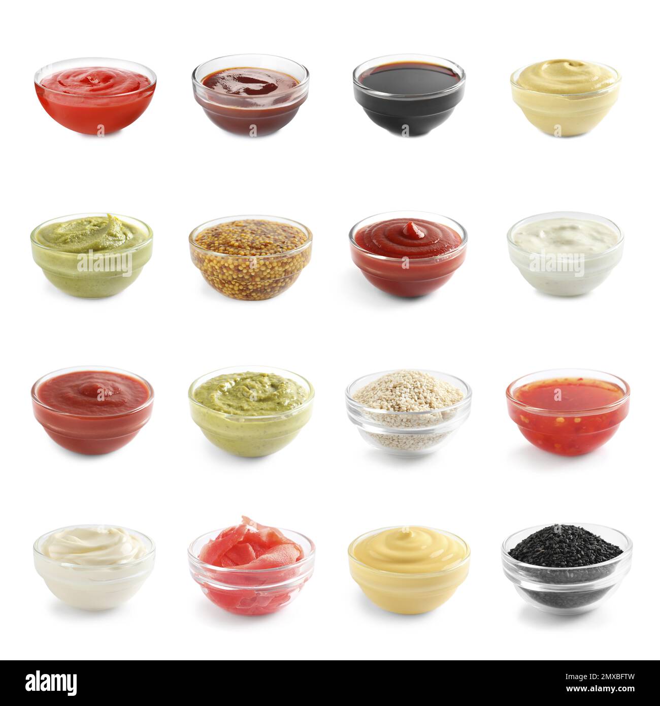 Set of different delicious sauces and condiments on white background