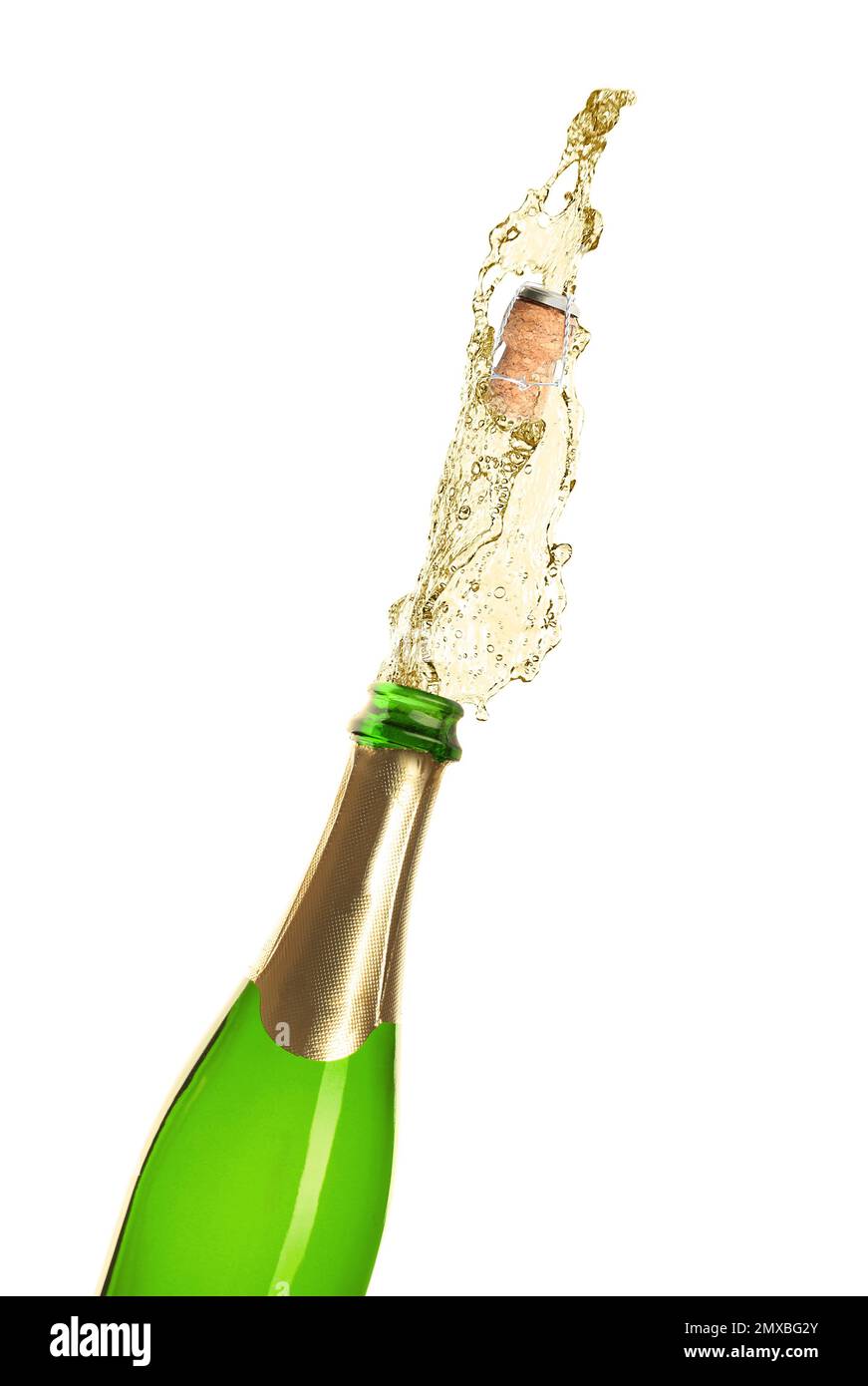 Champagne splashing out of bottle on white background Stock Photo