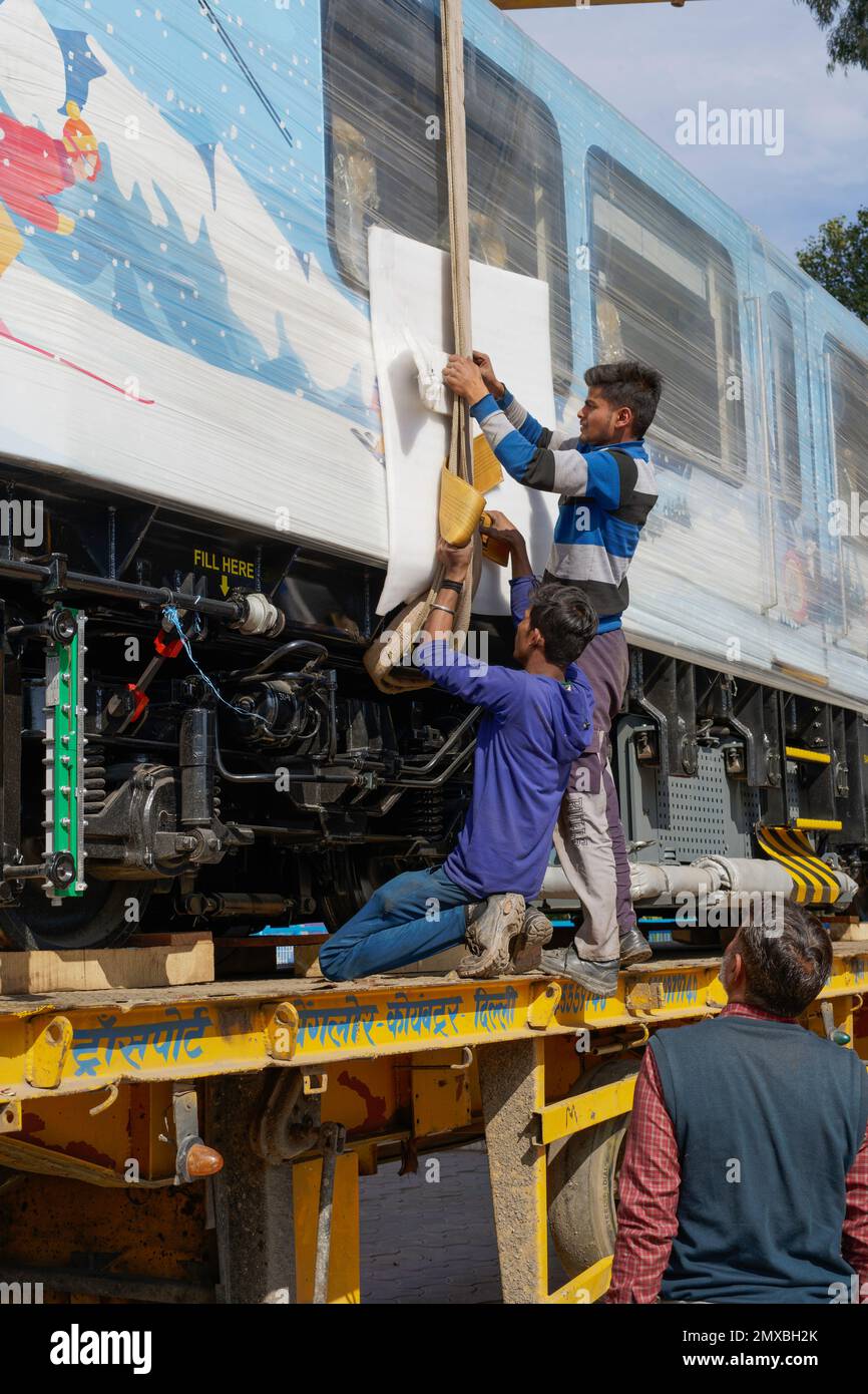 (Latest - News) New DHMU train Kalka to Shimla, Getting ready to be offloaded on track at Kalka (Haryana), India. Stock Photo