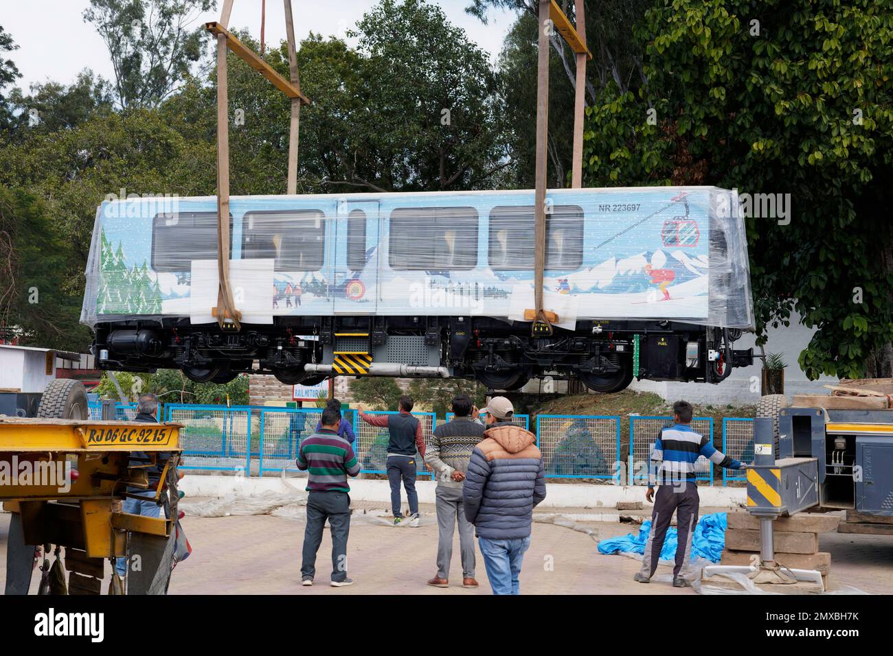 (Latest - News) New DHMU train Kalka to Shimla, Getting Offloaded on tracks at Kalka Station (Haryana), India. Stock Photo