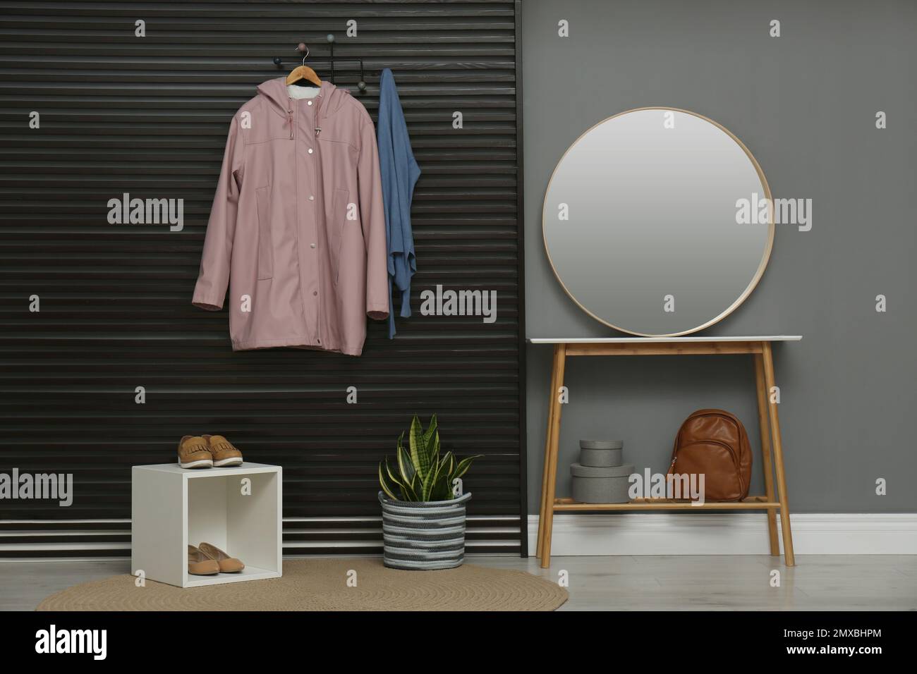 Hallway interior with stylish furniture, clothes and accessories Stock ...