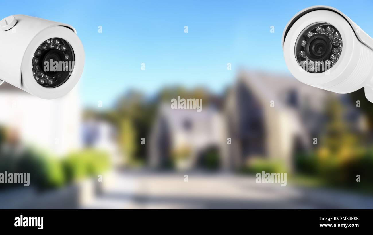 Home security system. House under CCTV cameras surveillance Stock Photo