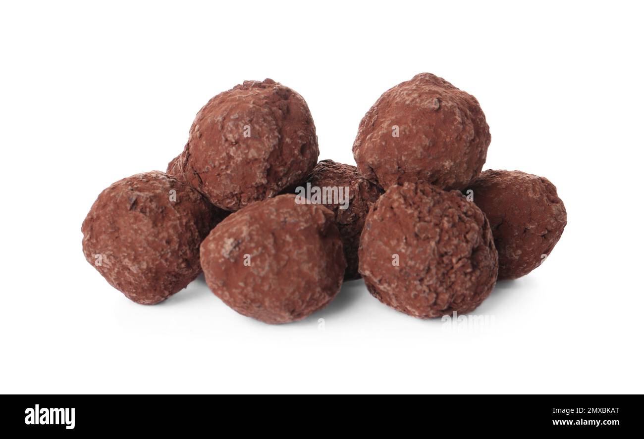 Tasty chocolate truffle candies isolated on white Stock Photo Alamy