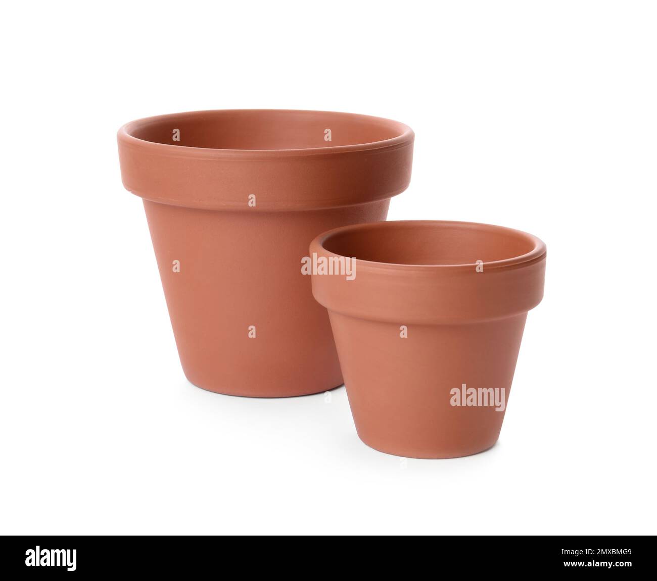 Stylish terracotta flower pots isolated on white Stock Photo - Alamy