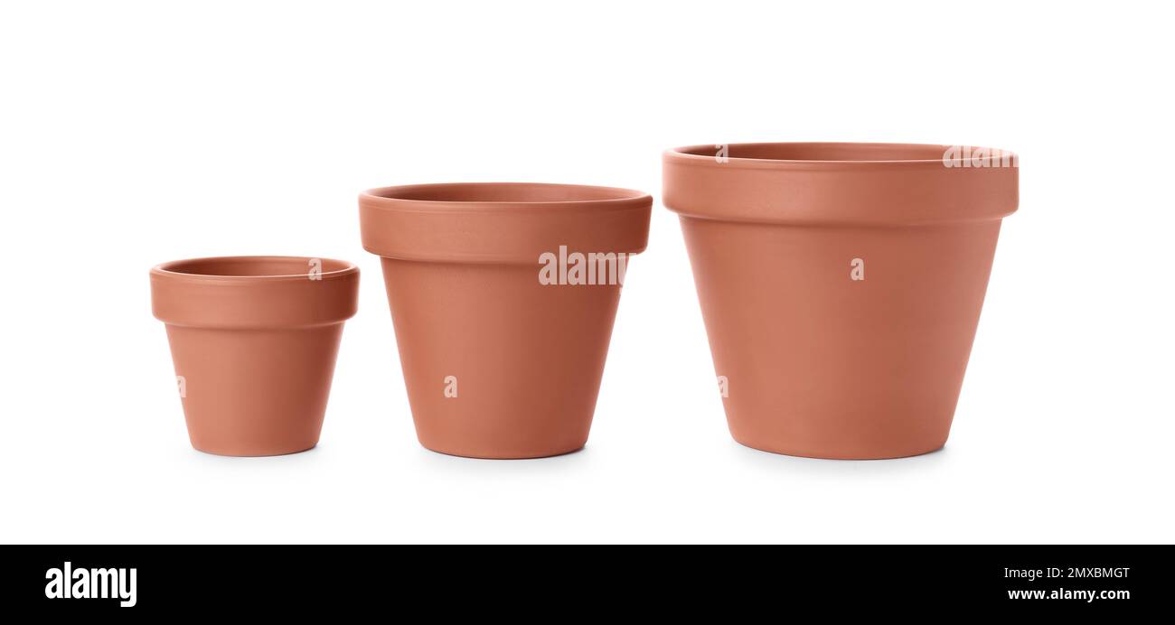 Stylish terracotta flower pots isolated on white Stock Photo Alamy
