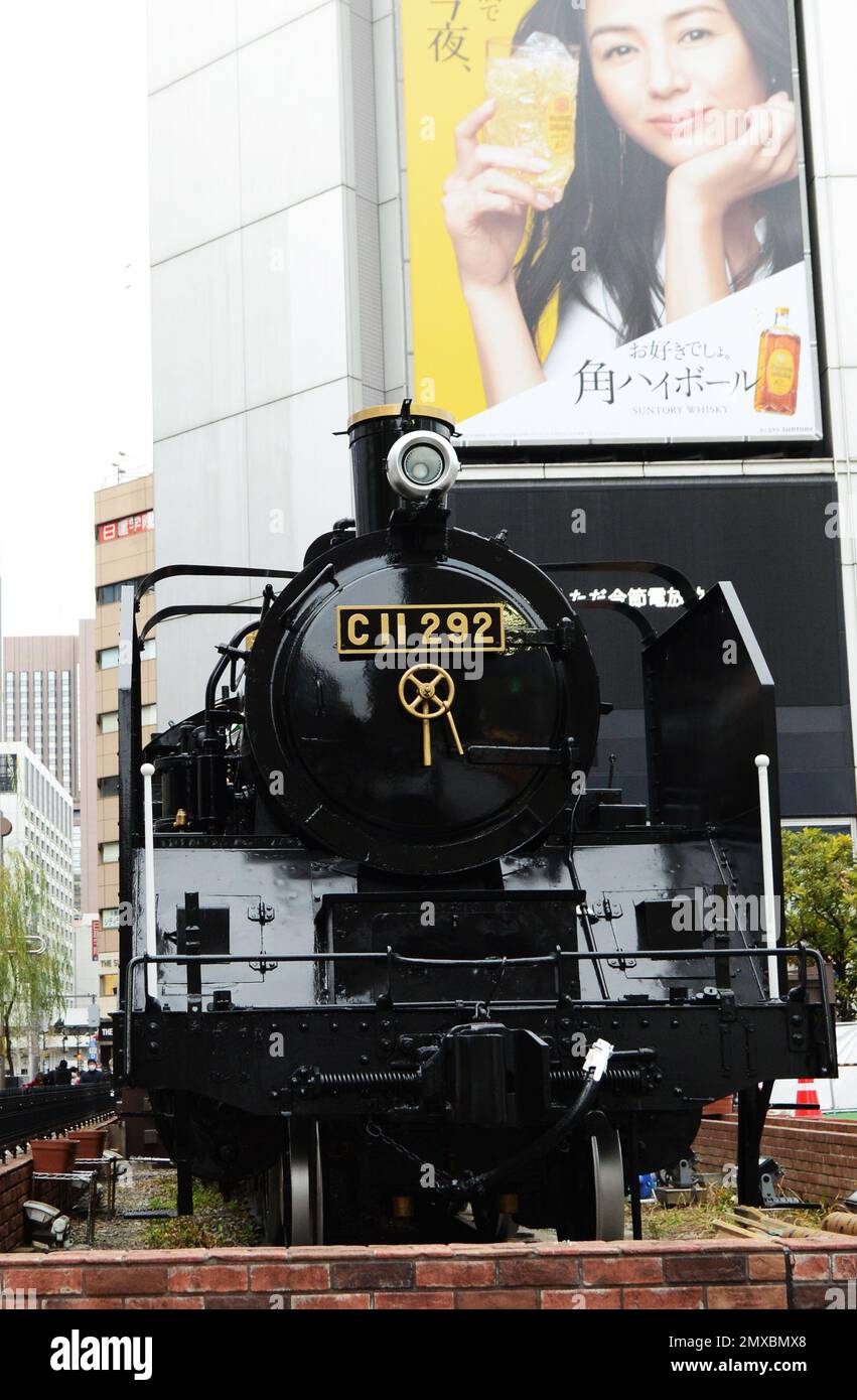 An old steam locomotive in front of the Shimbashi station, Tokyo, Japan. Stock Photo