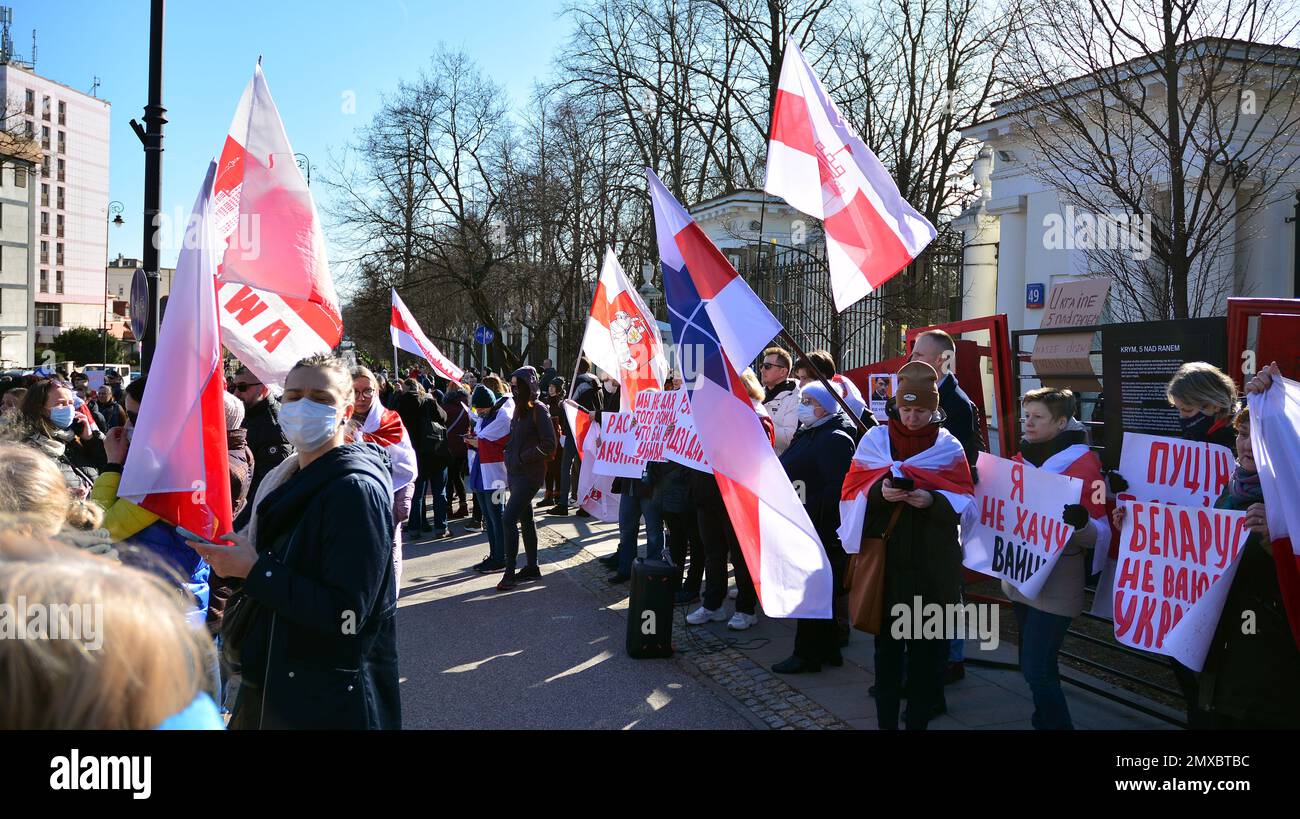 Warsaw, Poland. 24 February 2022. Anti-war protest outside Russian embassy in Warsaw. Demonstrators call for peace and condemn Putin. Stock Photo