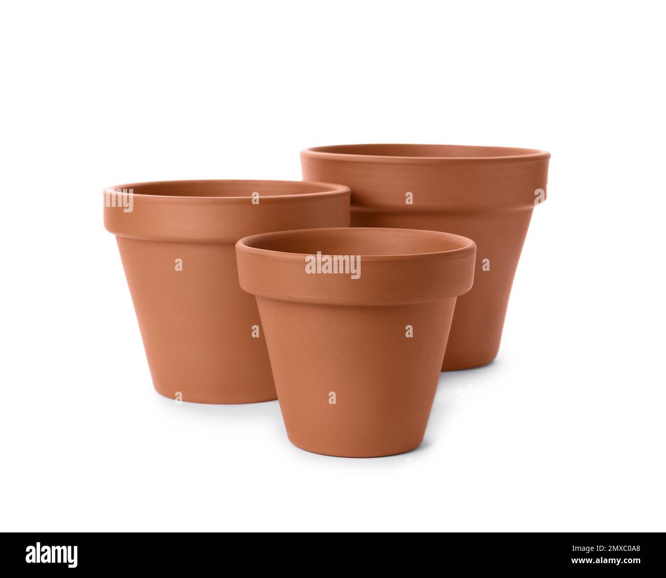 Stylish terracotta flower pots isolated on white Stock Photo - Alamy