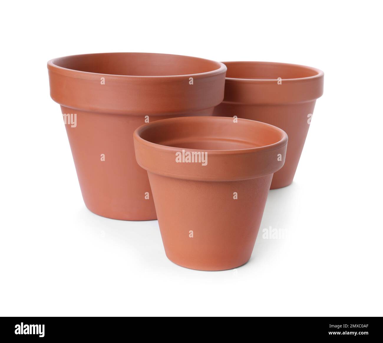 Stylish terracotta flower pots isolated on white Stock Photo - Alamy