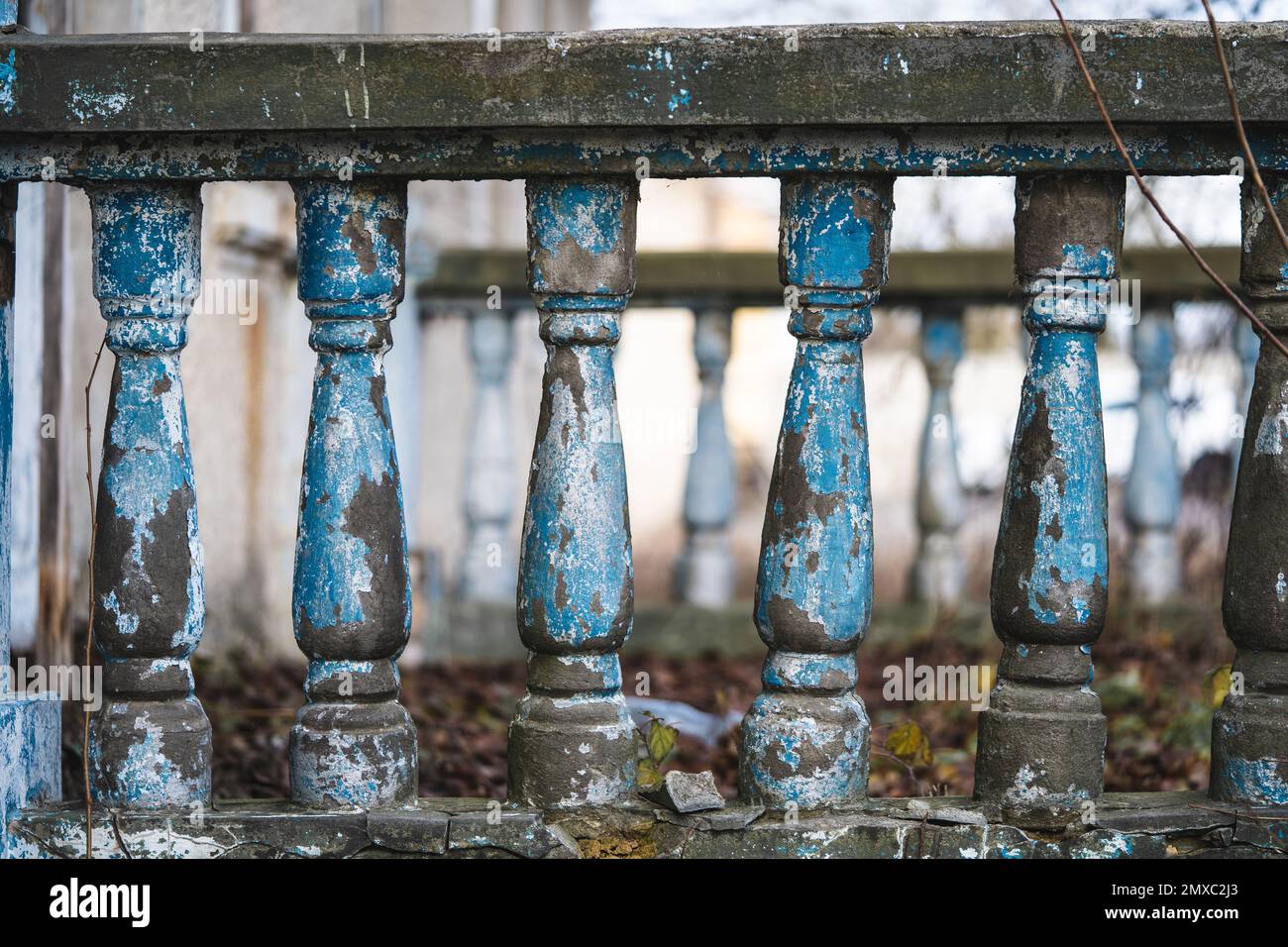a balustrade on the railing of an old cracked staircase Stock Photo - Alamy