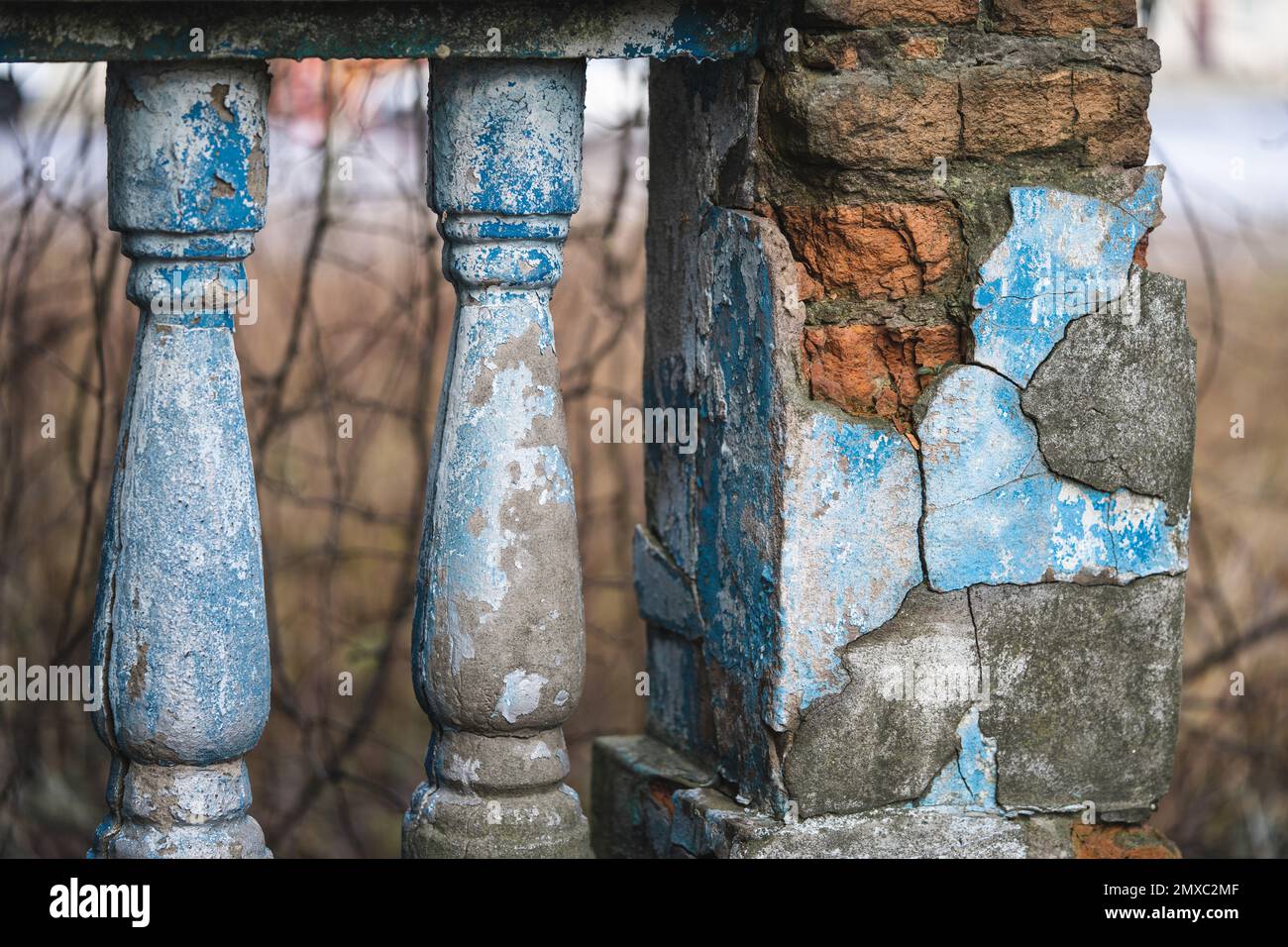 Slumped Over Railing a balustrade on the railing of an old cracked staircase Stock Photo - Alamy