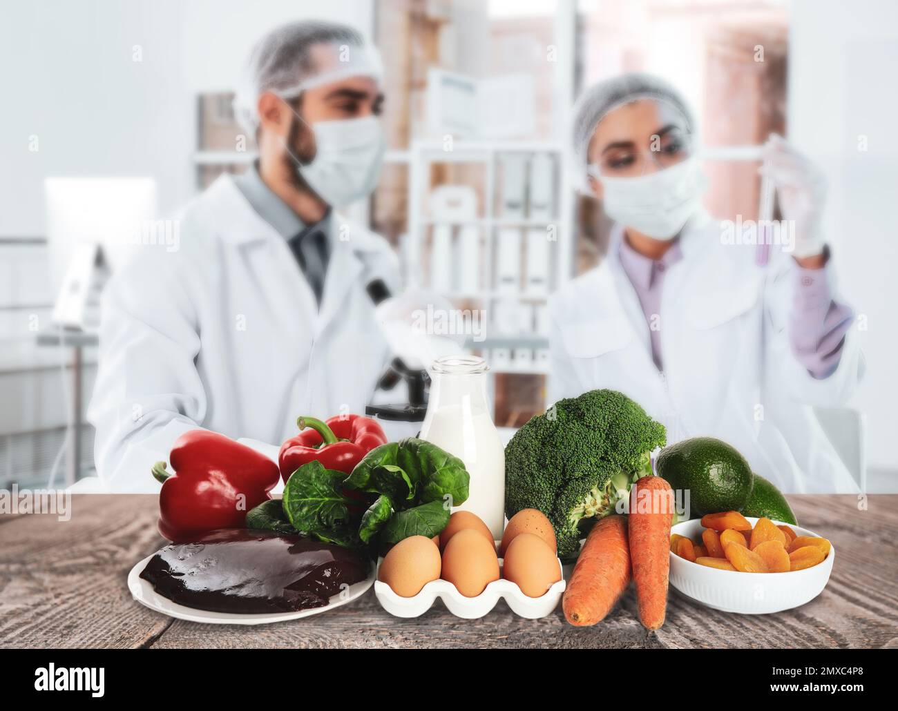 Scientists inspecting products in laboratory. Food quality control ...