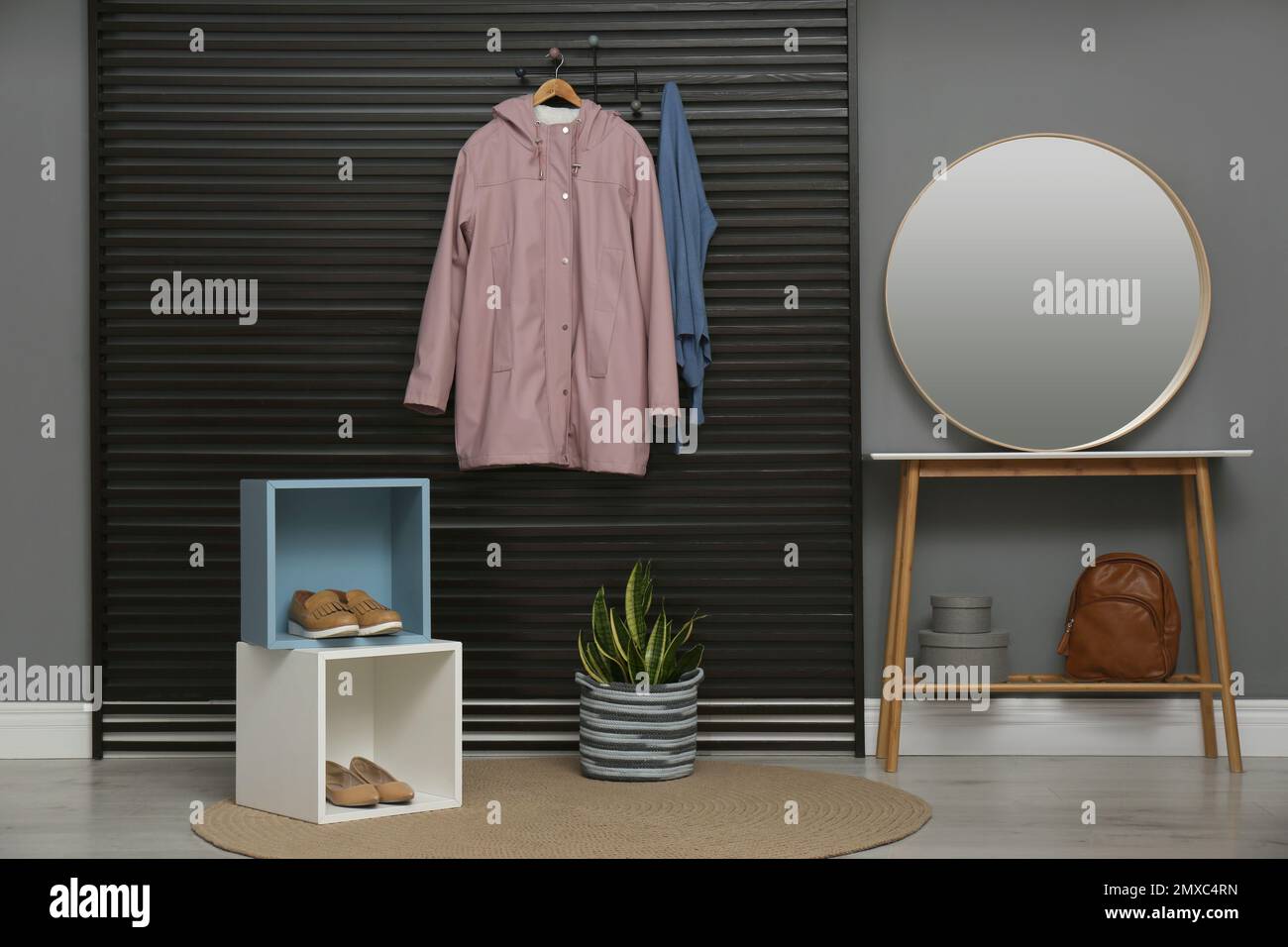Hallway interior with stylish furniture, clothes and accessories Stock ...
