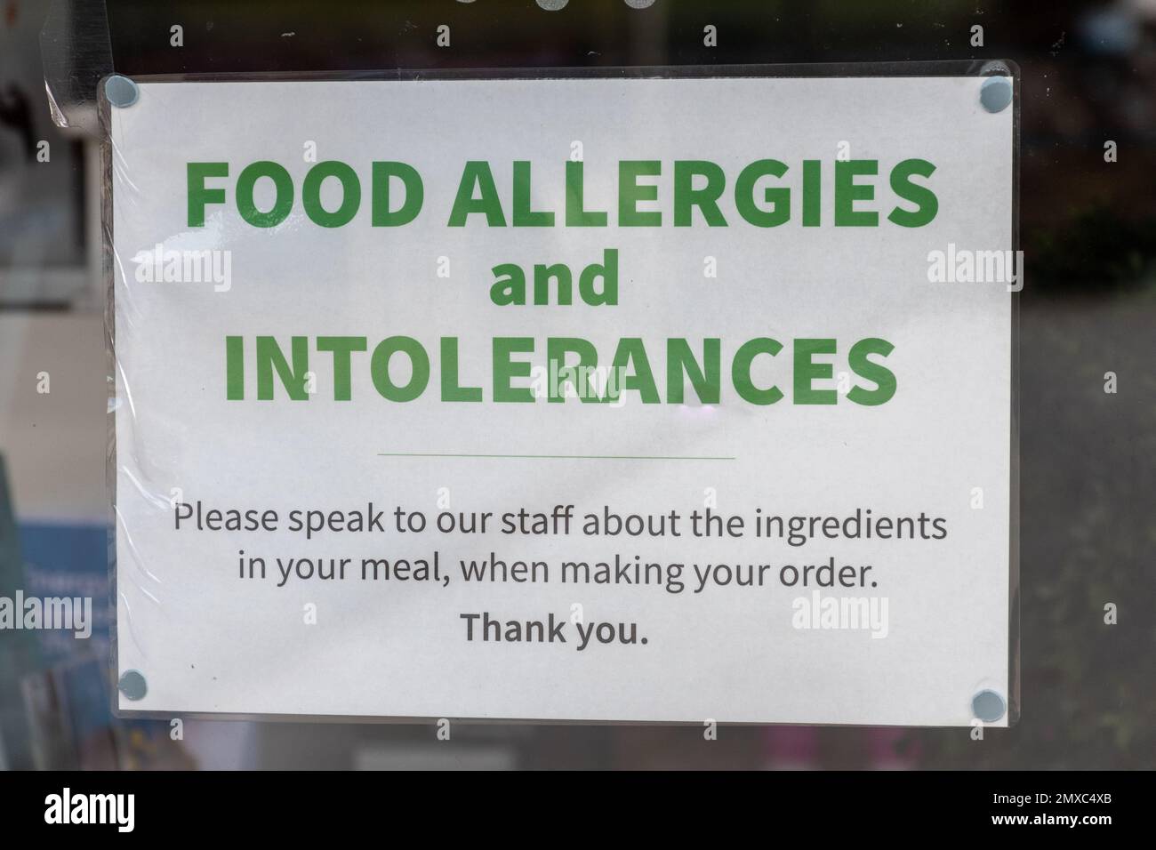 Food Allergies and Intolerances, notice or sign in a cafe window, UK Stock Photo