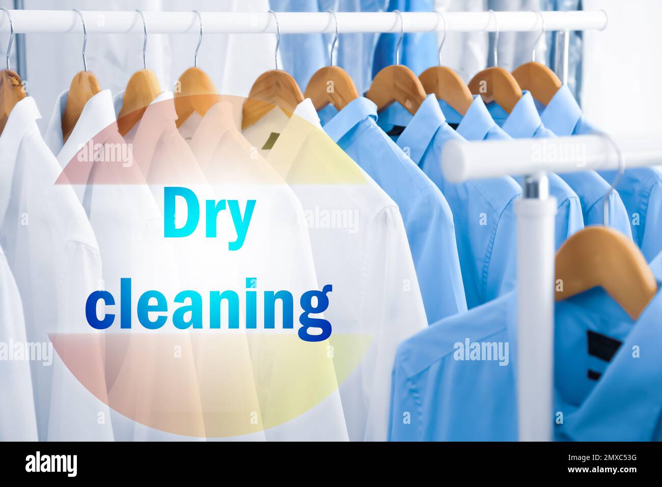 Concept of dry cleaning service. Hangers with clean clothes hanging on rack  Stock Photo - Alamy
