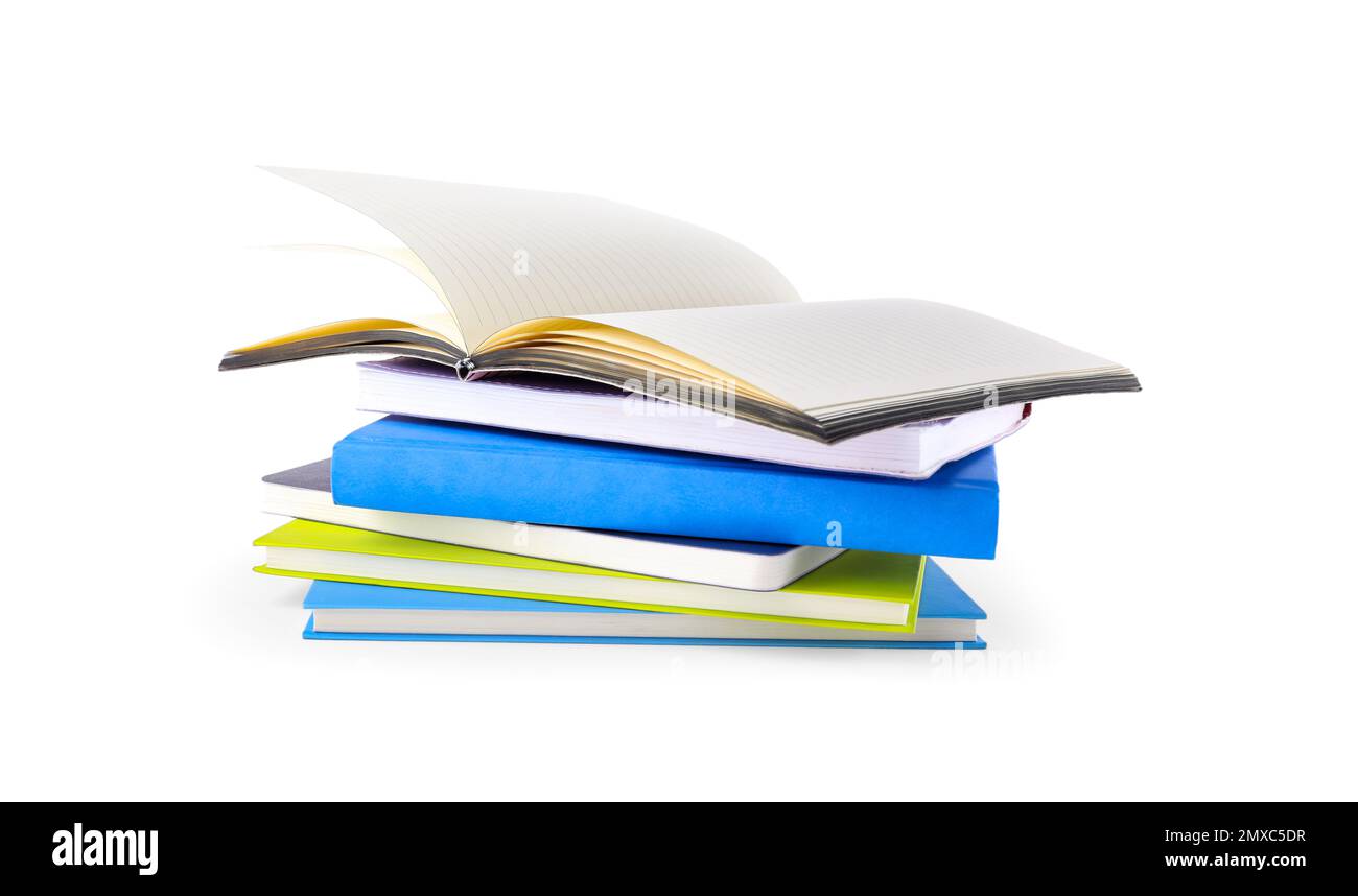 Stack of different notepads isolated on white Stock Photo